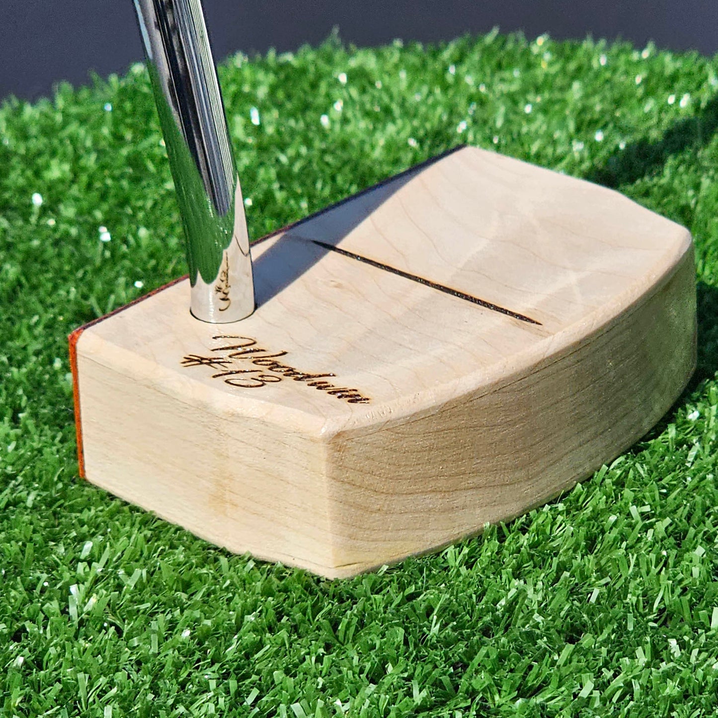 Curly Hard Maple putter with Red Padauk Face plate