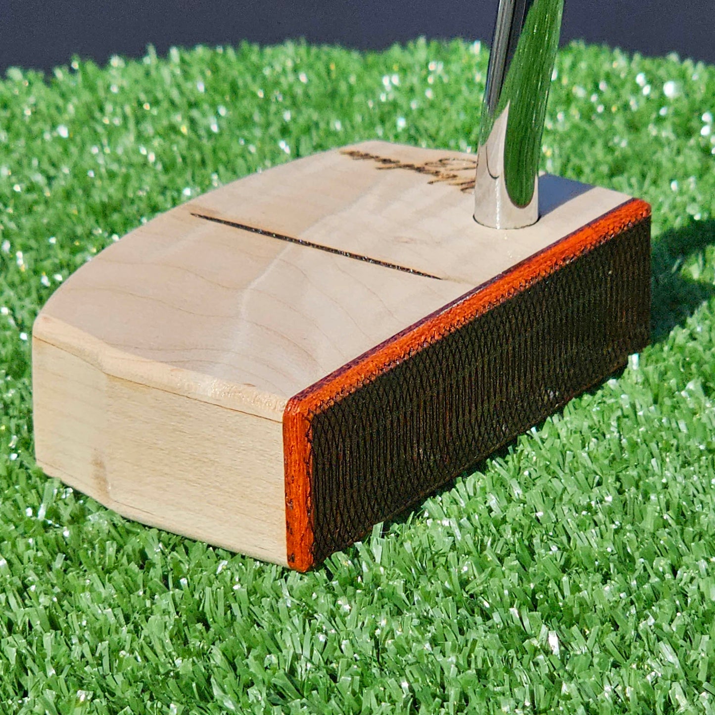 Curly Hard Maple putter with Red Padauk Face plate