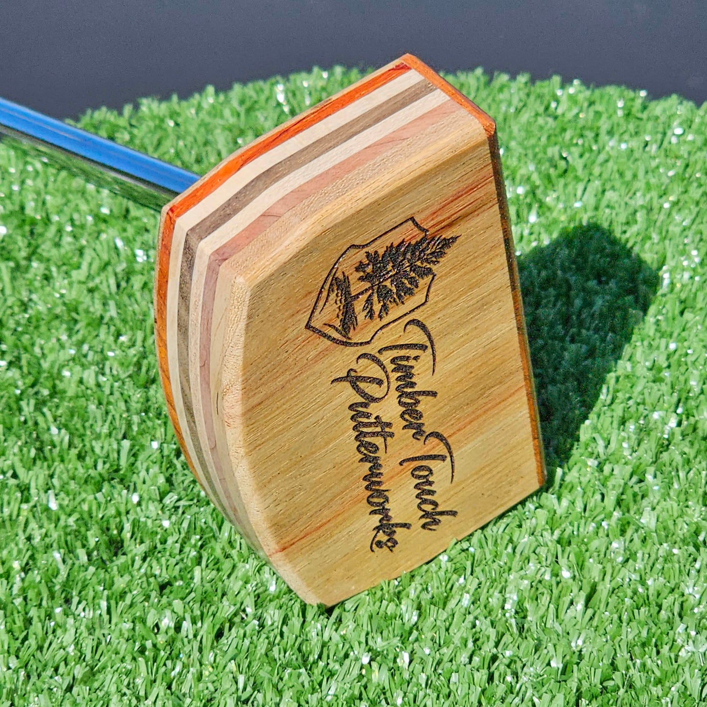 Canarywood putter with Padauk wood faceplate and multimaterial wood body