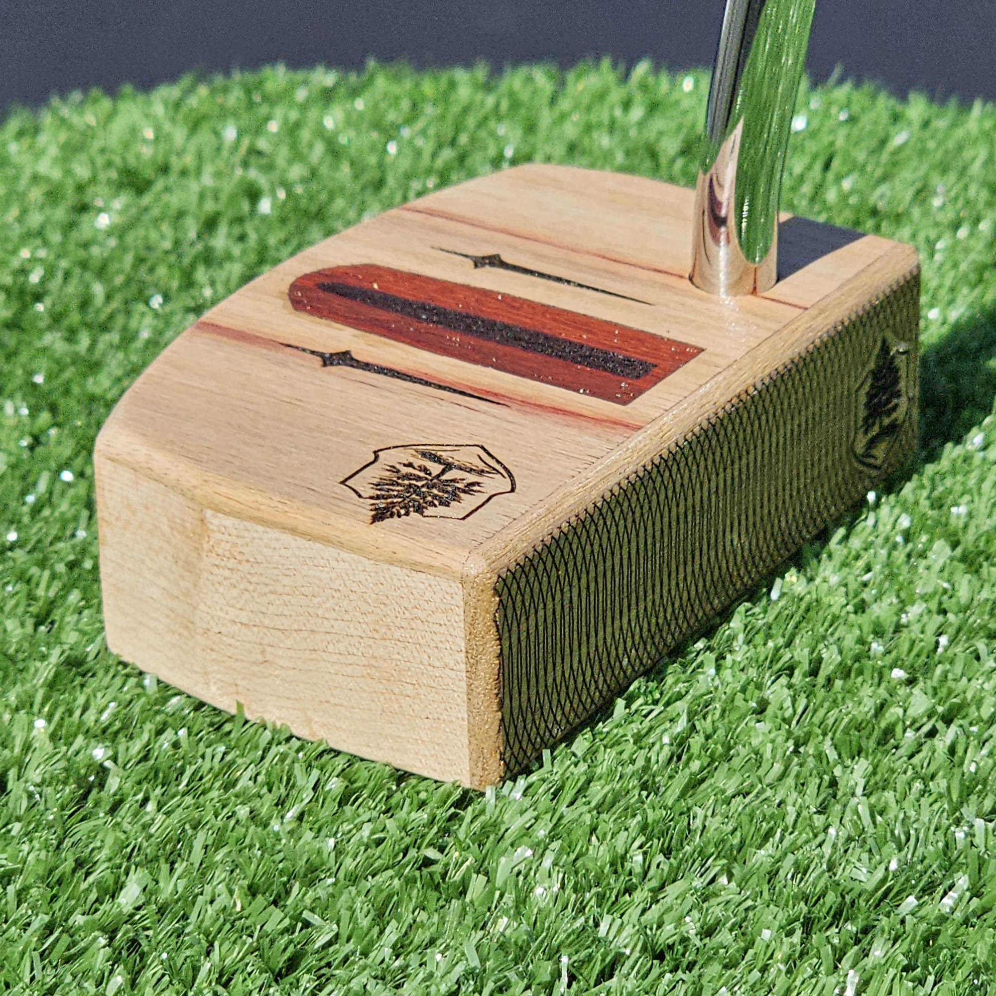 Curly Maple putter with Canarywood top and faceplate with Paduak Inlay