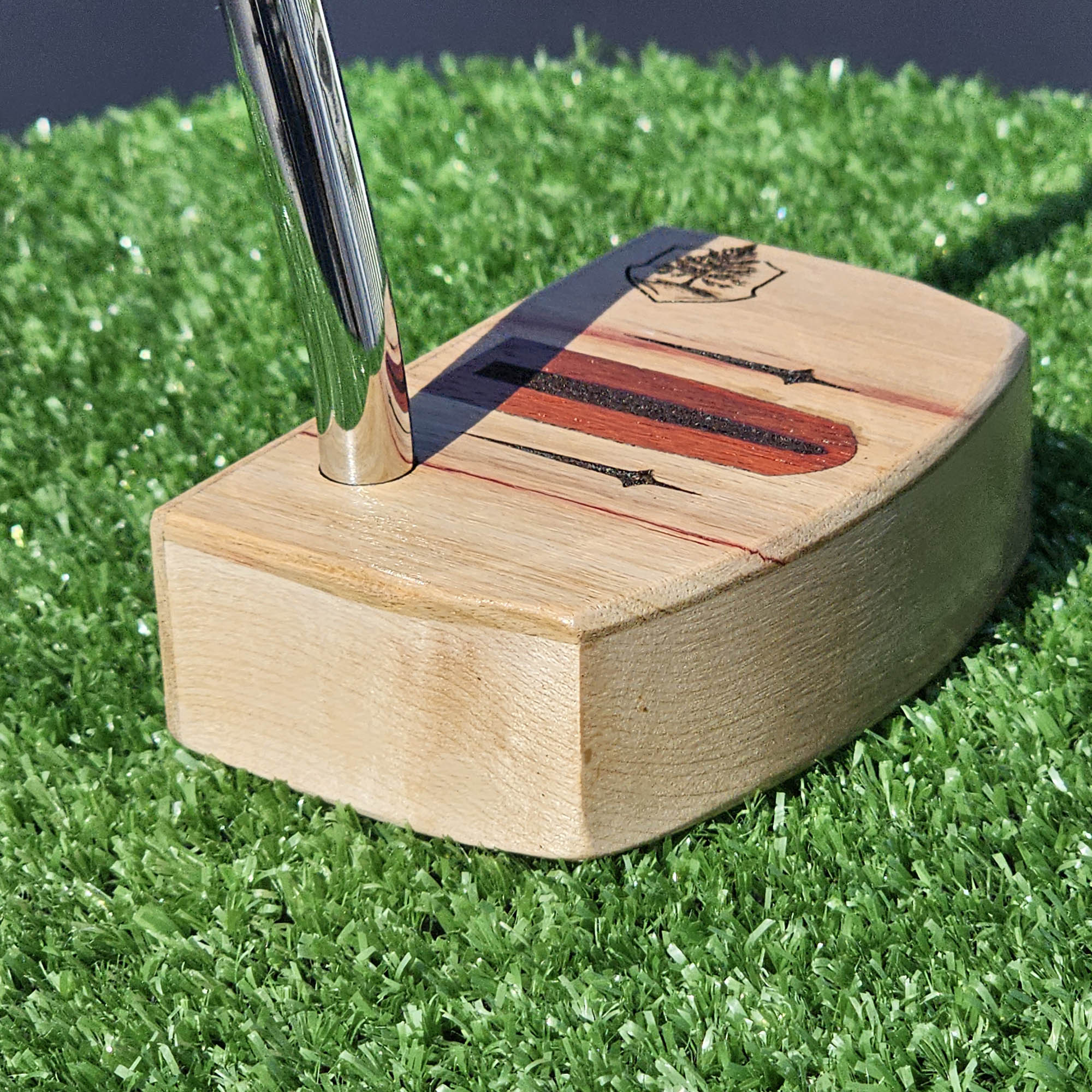 Curly Maple putter with Canarywood top and faceplate with Paduak Inlay