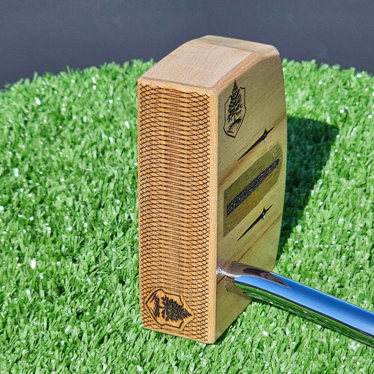 Curly Maple putter with Canarywood top and faceplate with Paduak Inlay