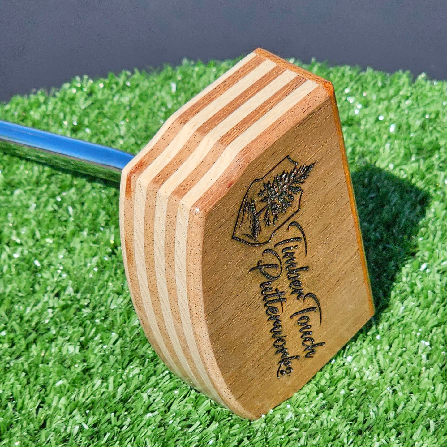 Layered Red Oak and Mahogany putter with decorative inlay