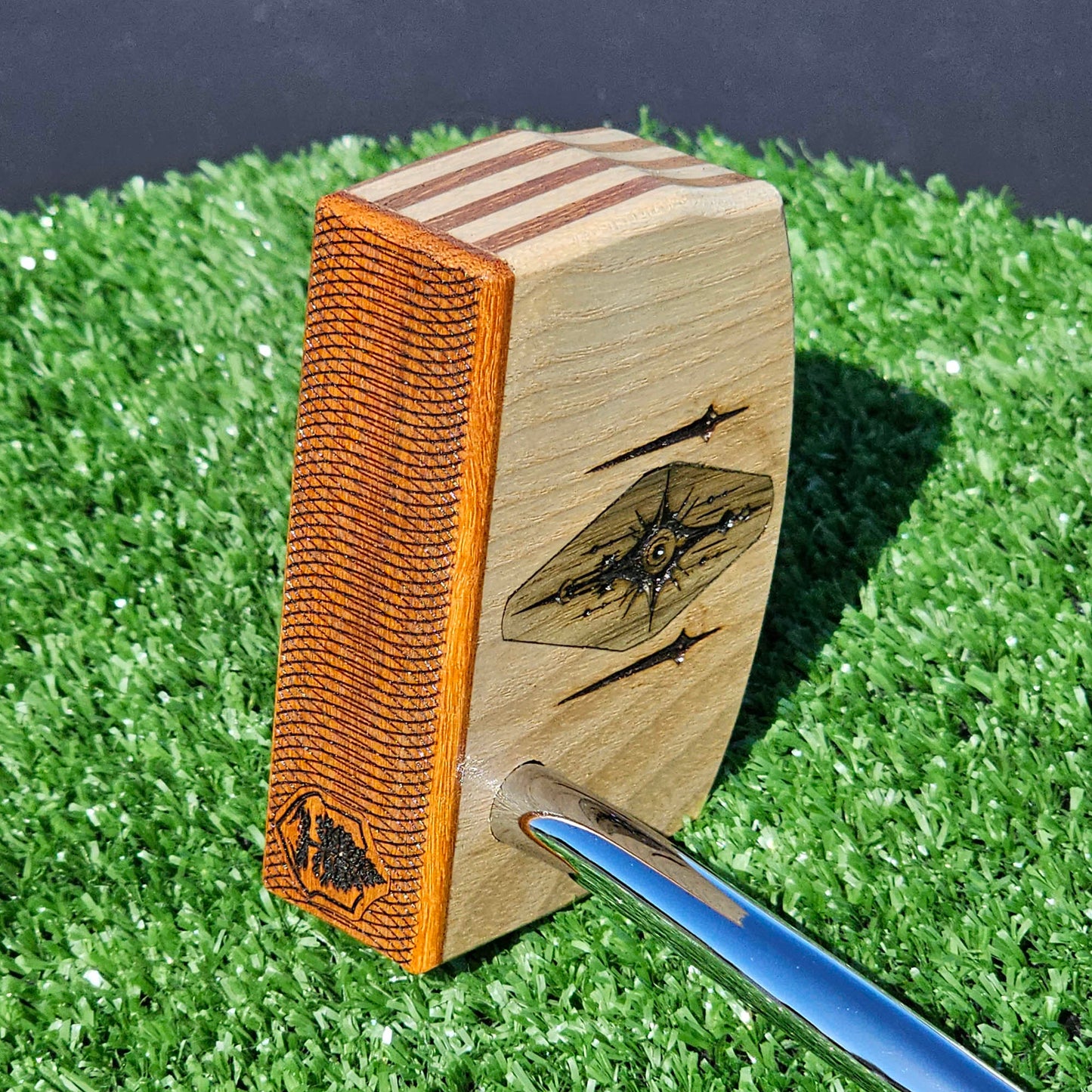 Layered Red Oak and Mahogany putter with decorative inlay