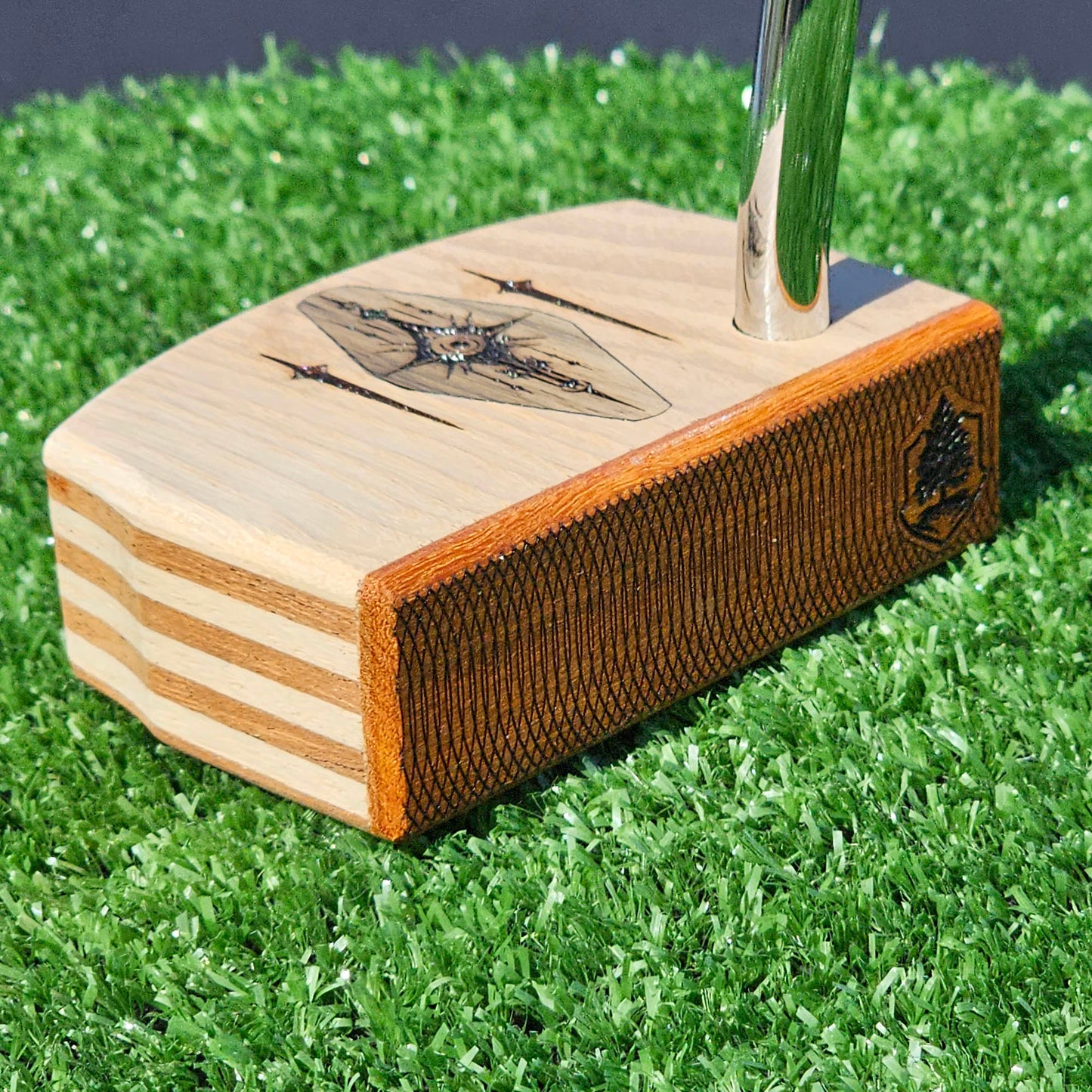 Layered Red Oak and Mahogany putter with decorative inlay