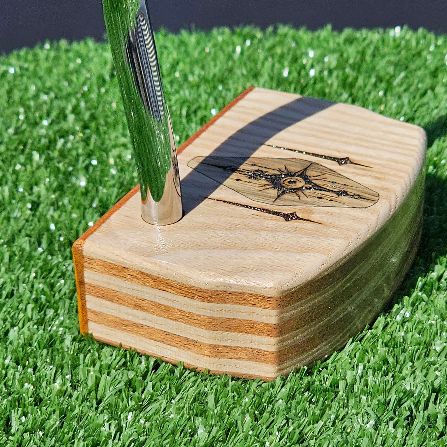 Layered Red Oak and Mahogany putter with decorative inlay