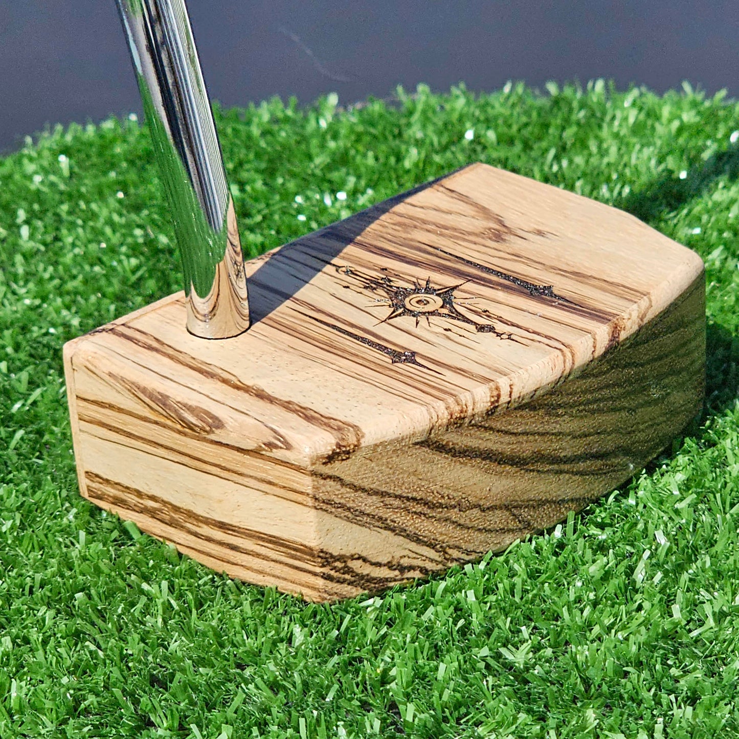 Zebrawood putter with fancy engraved top alignment features