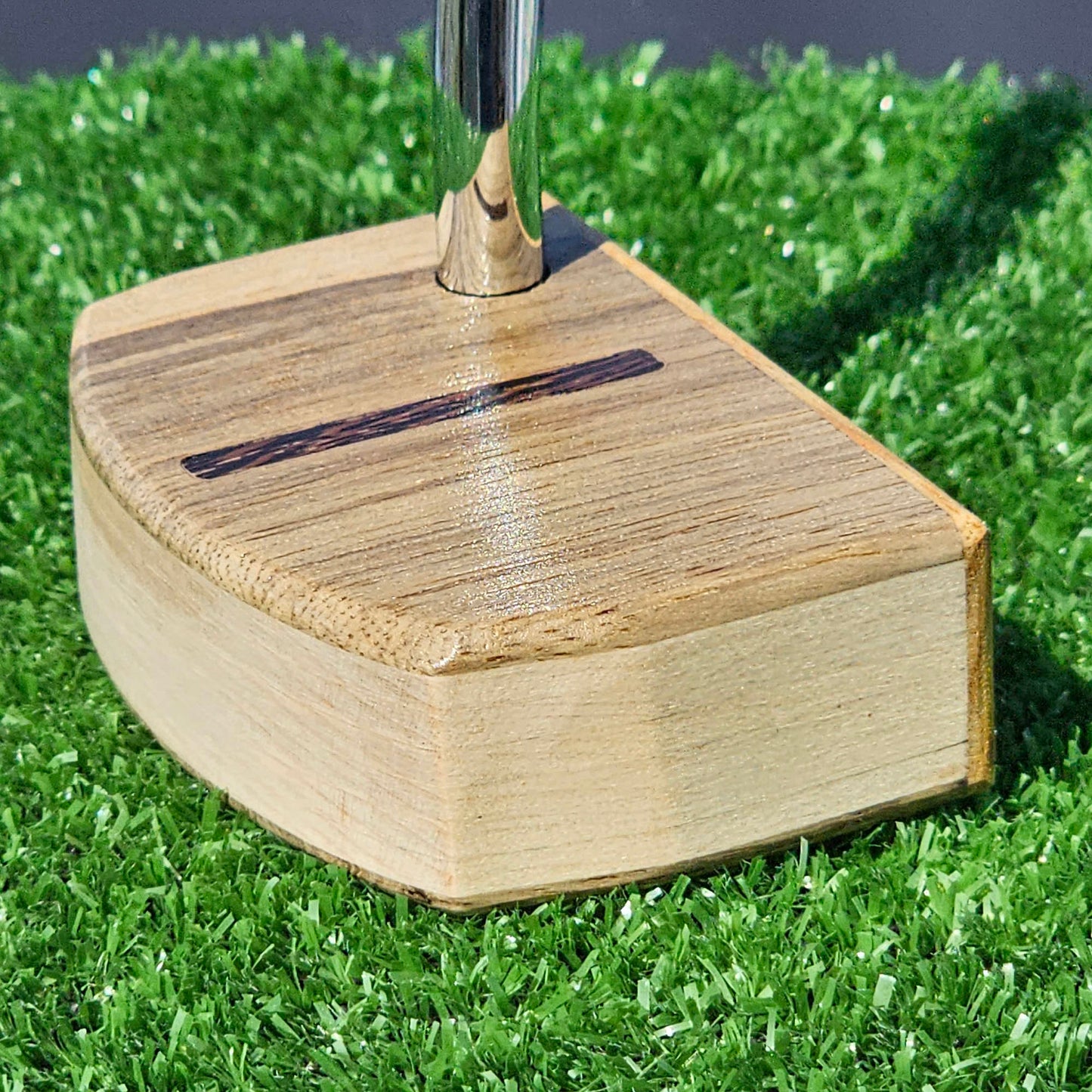 Black Limba and Hard Red Oak putter with clean line top alignment feature