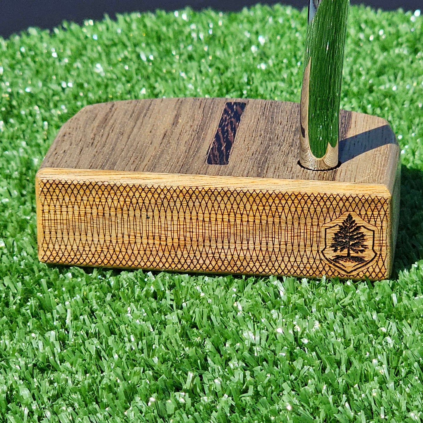 Black Limba and Hard Red Oak putter with clean line top alignment feature