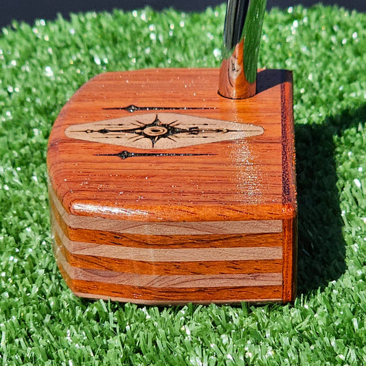 Layered Bloodwood and Red Cedar putter with decorative inlay