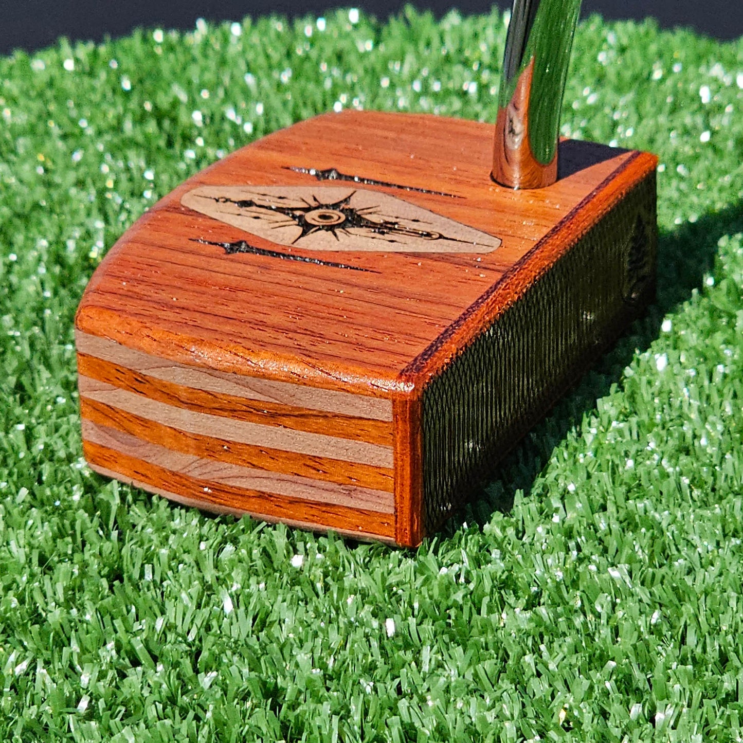 Layered Bloodwood and Red Cedar putter with decorative inlay