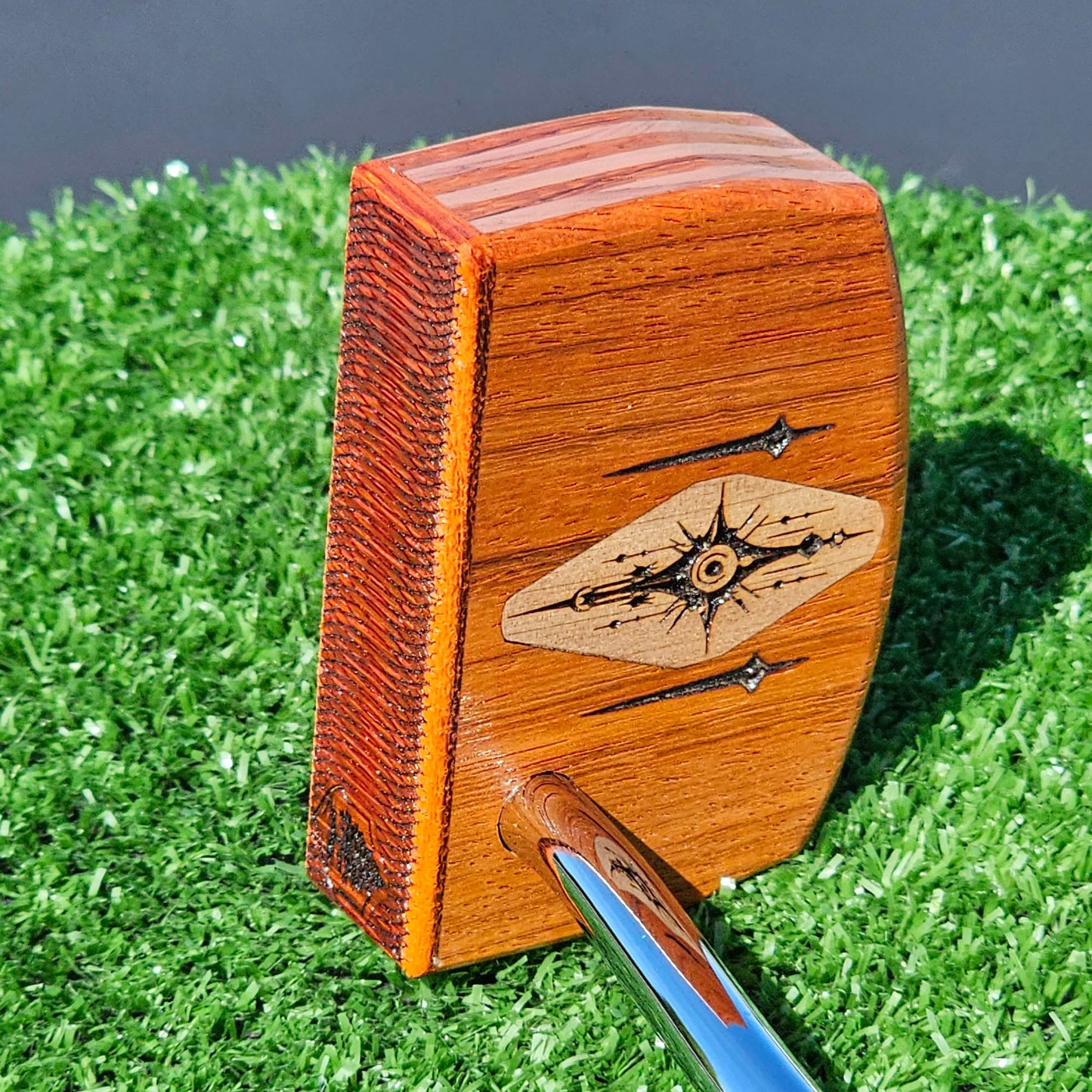 Layered Bloodwood and Red Cedar putter with decorative inlay