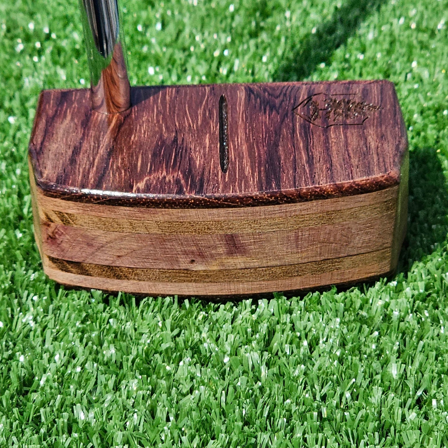 Bolivian Rosewood putter with Cedar and other exotic wood layers