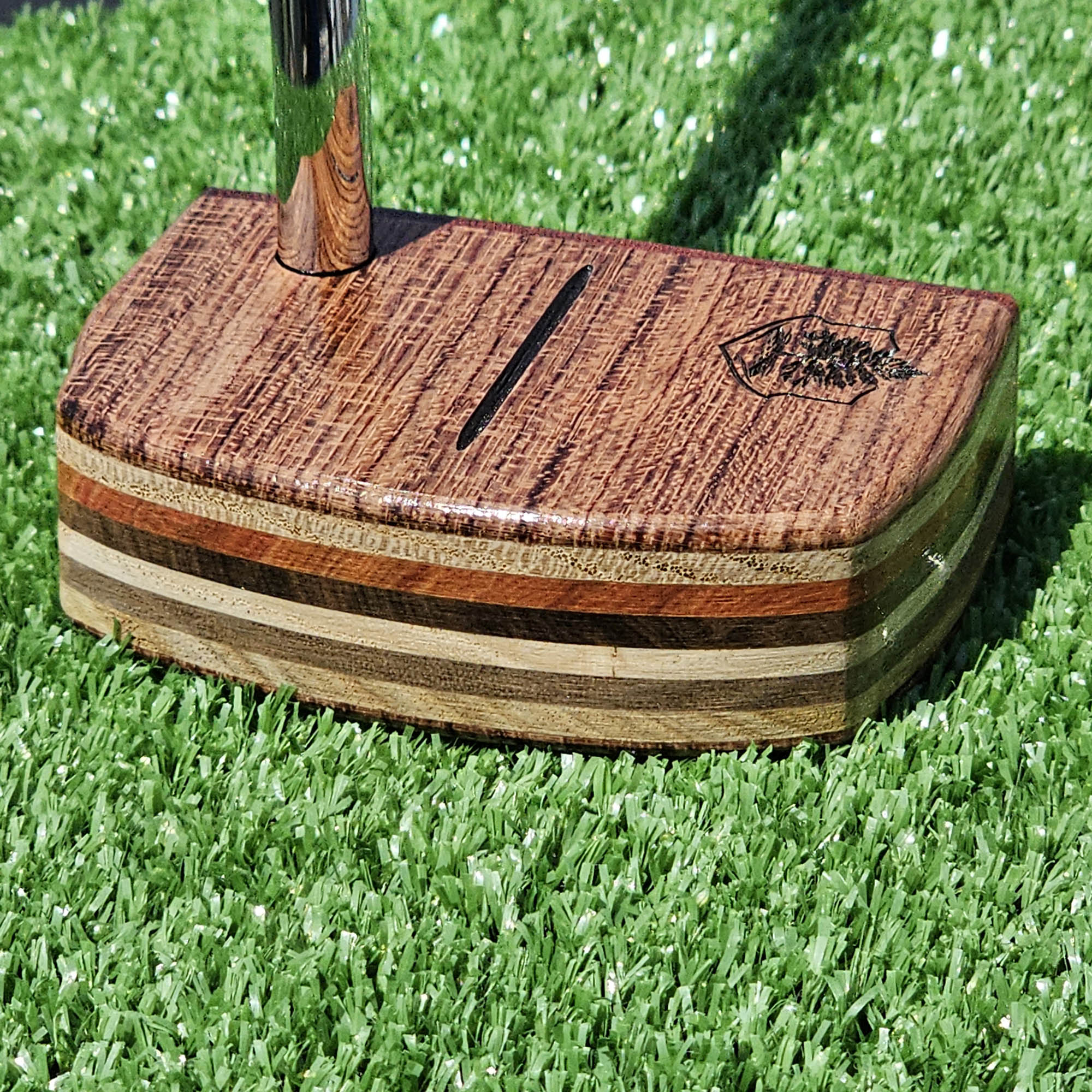 Padauk and Babinga wood putter with many layered exotic wood body