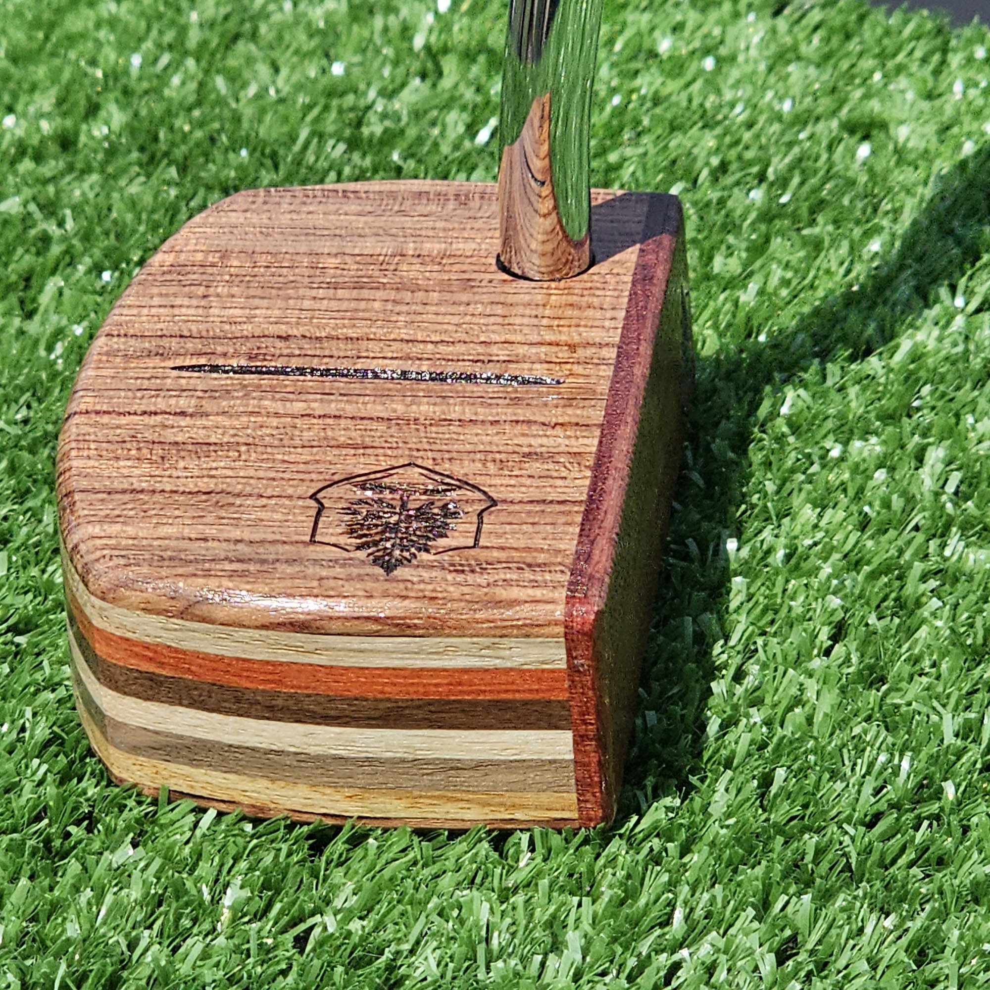 Padauk and Babinga wood putter with many layered exotic wood body