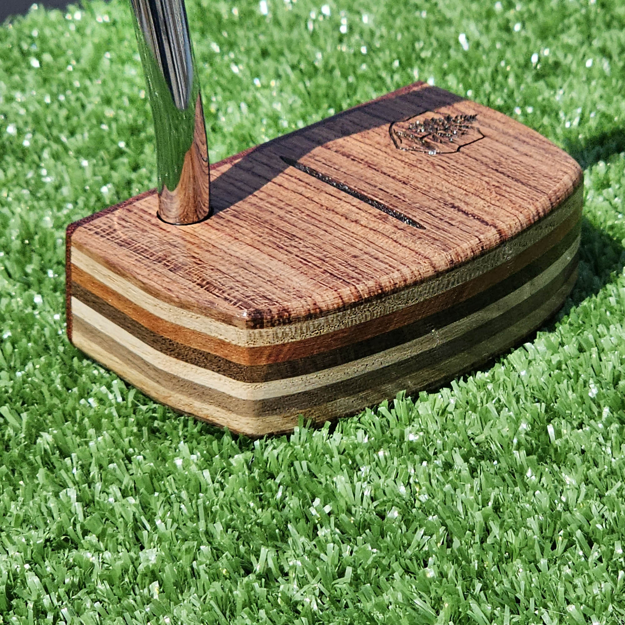 Padauk and Babinga wood putter with many layered exotic wood body