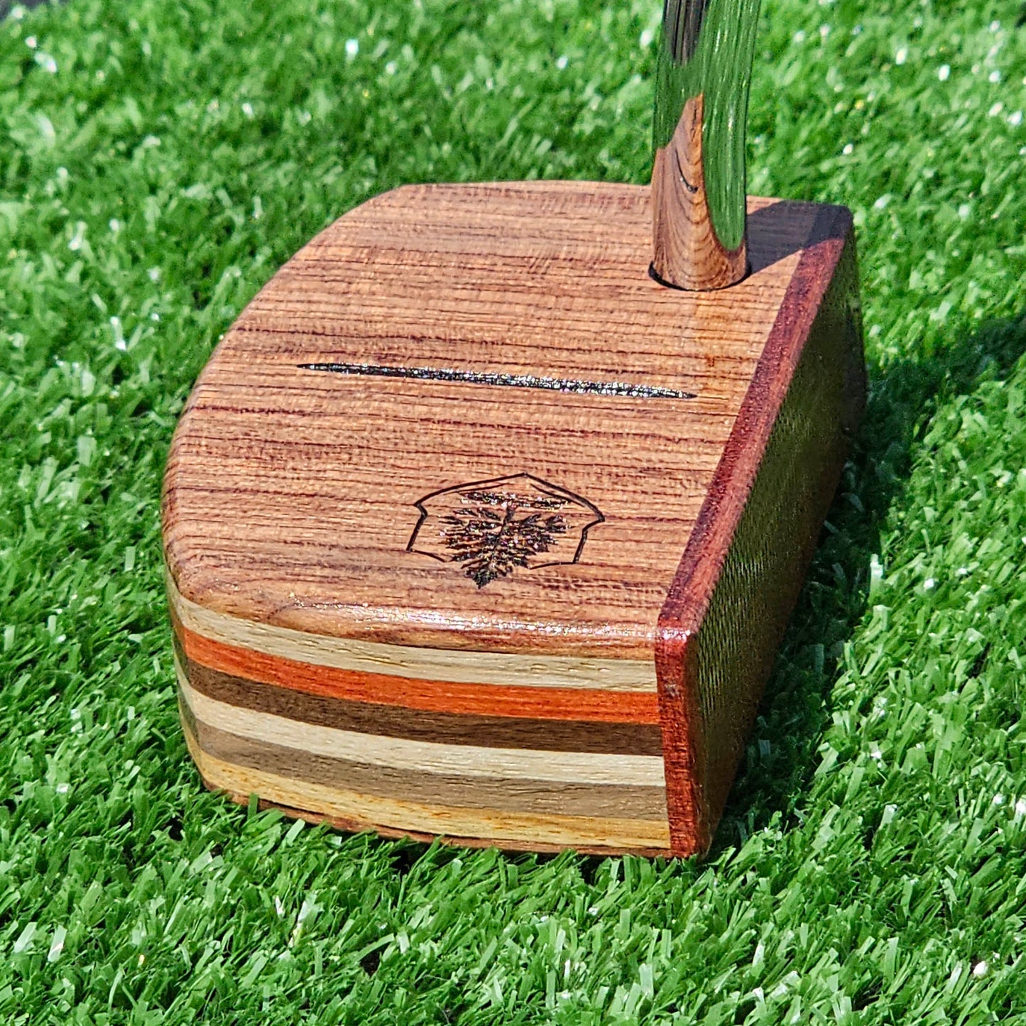 Padauk and Babinga wood putter with many layered exotic wood body