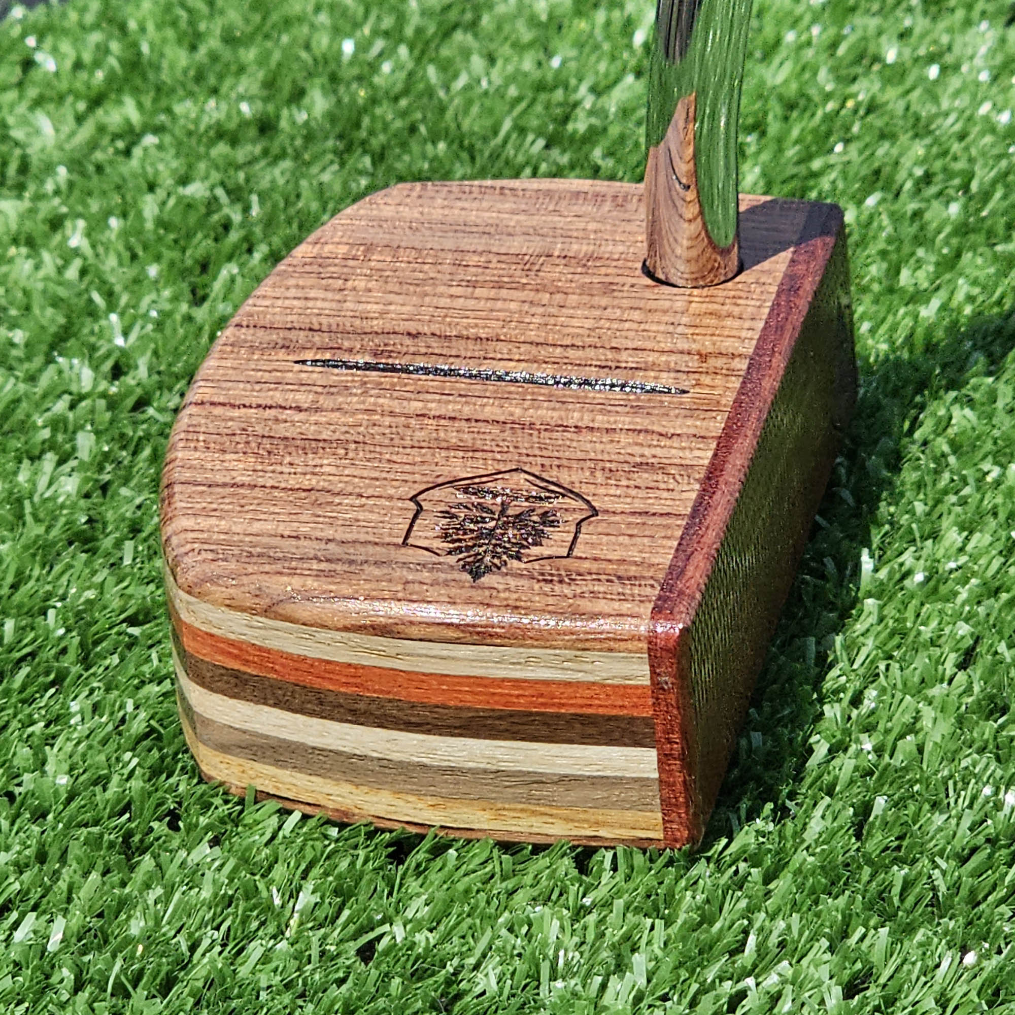 Padauk and Babinga wood putter with many layered exotic wood body