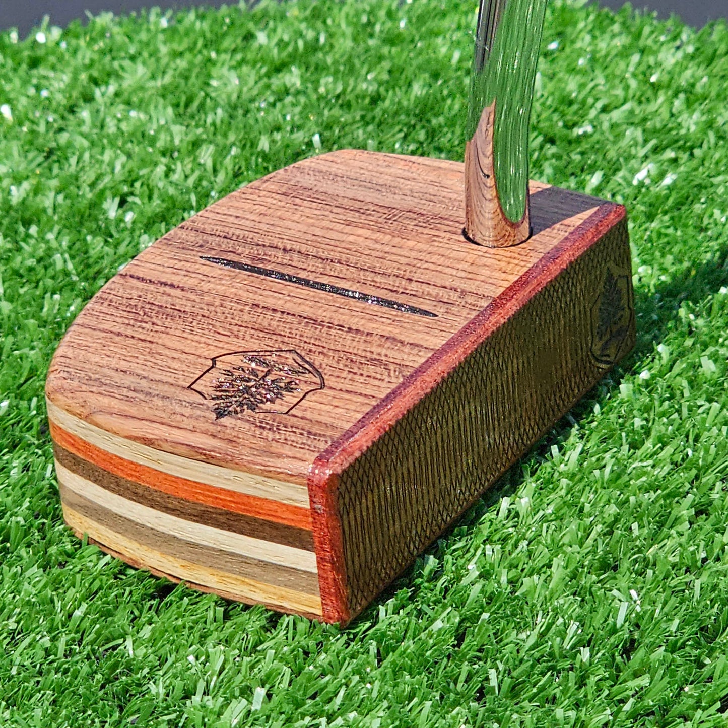 Padauk and Babinga wood putter with many layered exotic wood body