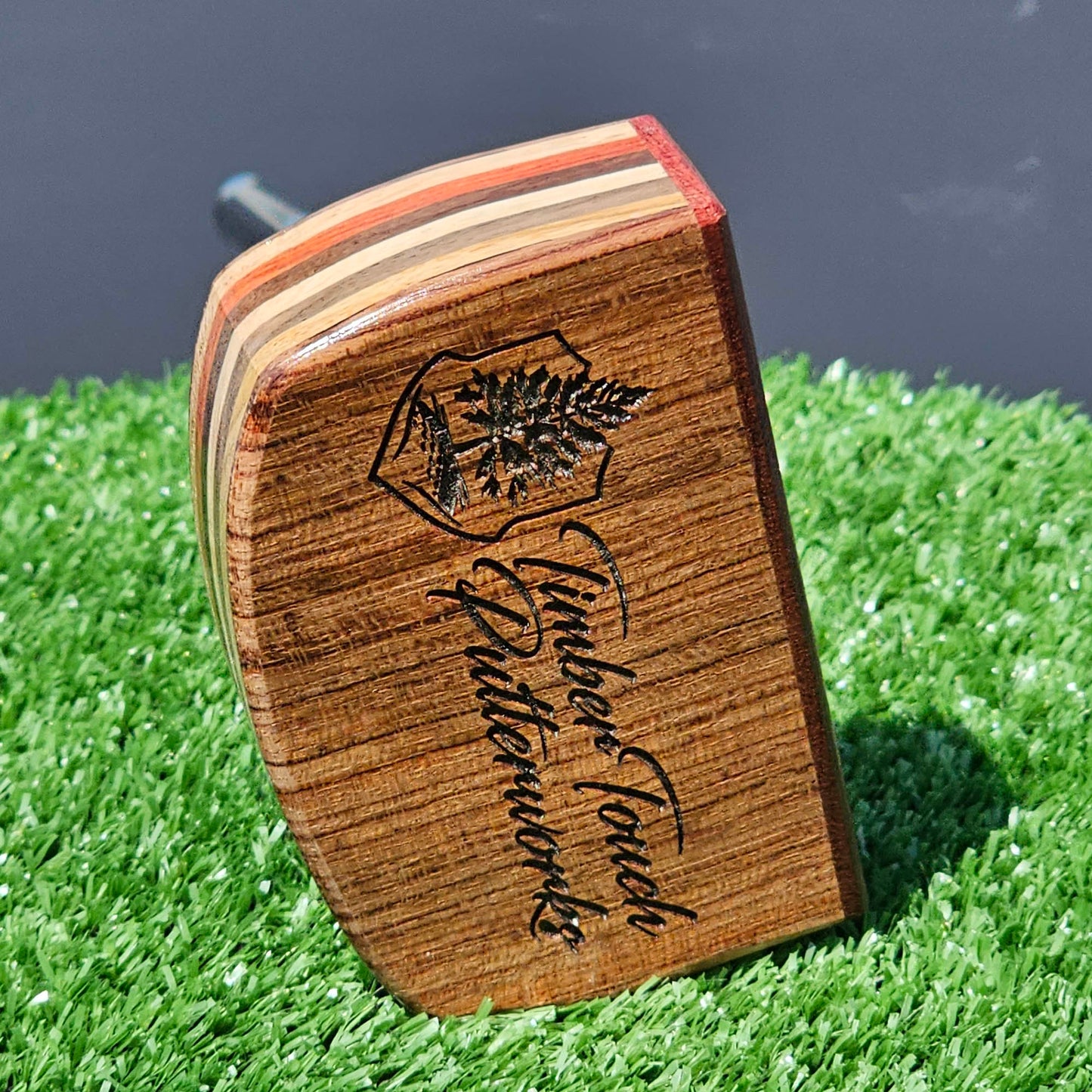 Padauk and Babinga wood putter with many layered exotic wood body