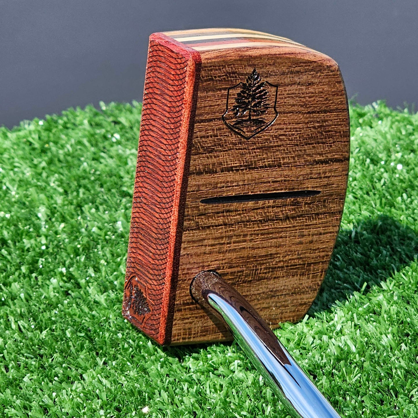 Padauk and Babinga wood putter with many layered exotic wood body