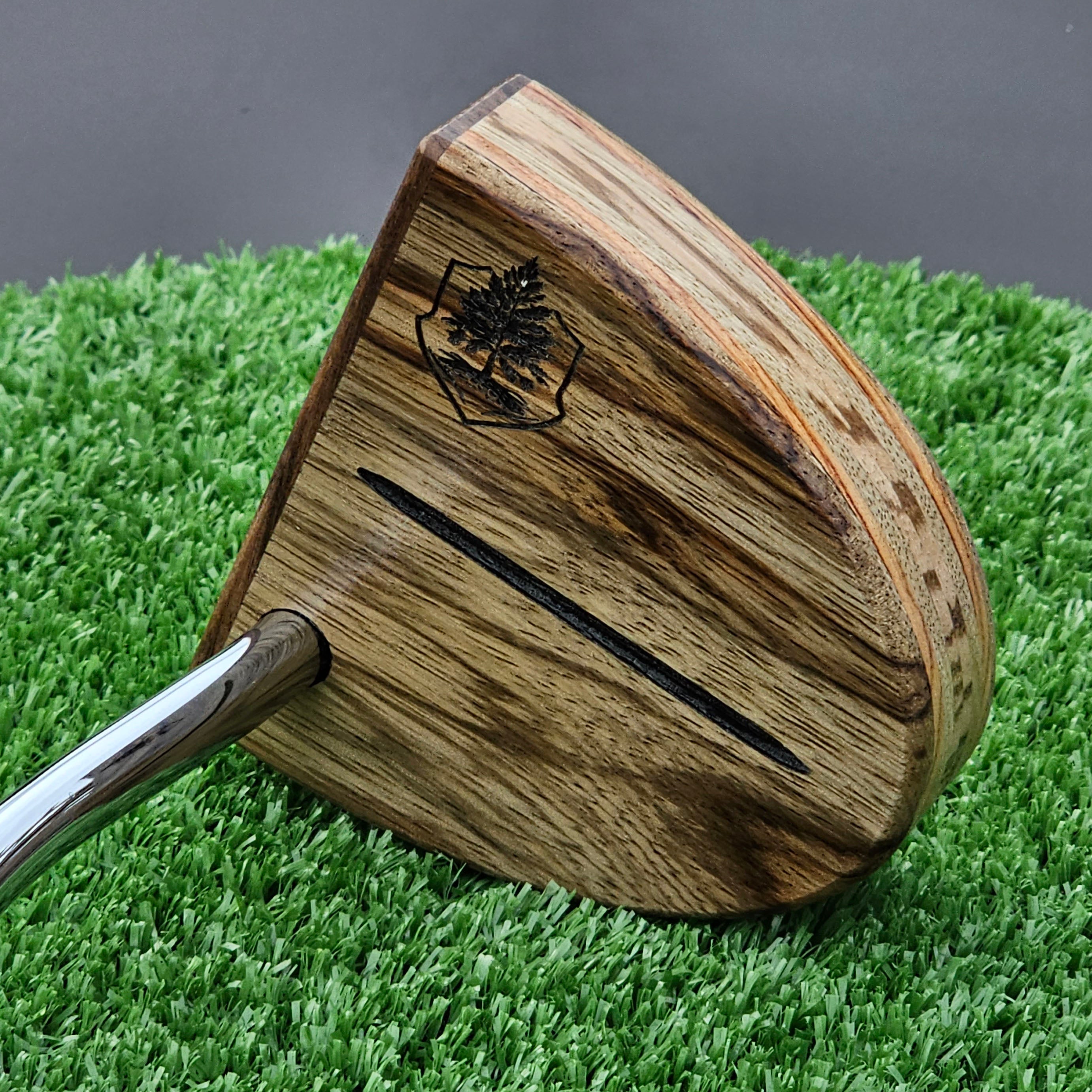 Black Limba exotic wood putter with Rosewood face and layered body