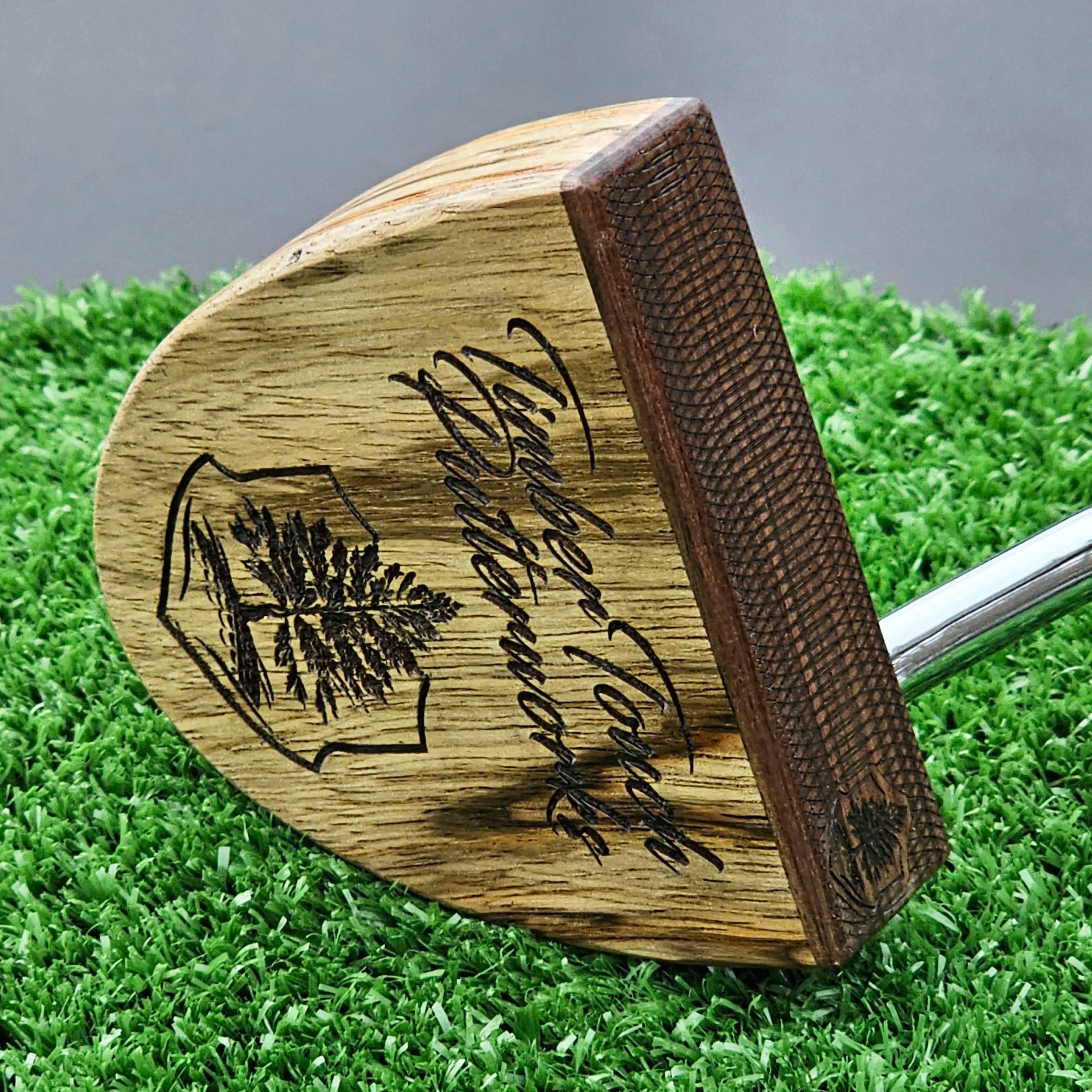 Black Limba exotic wood putter with Rosewood face and layered body