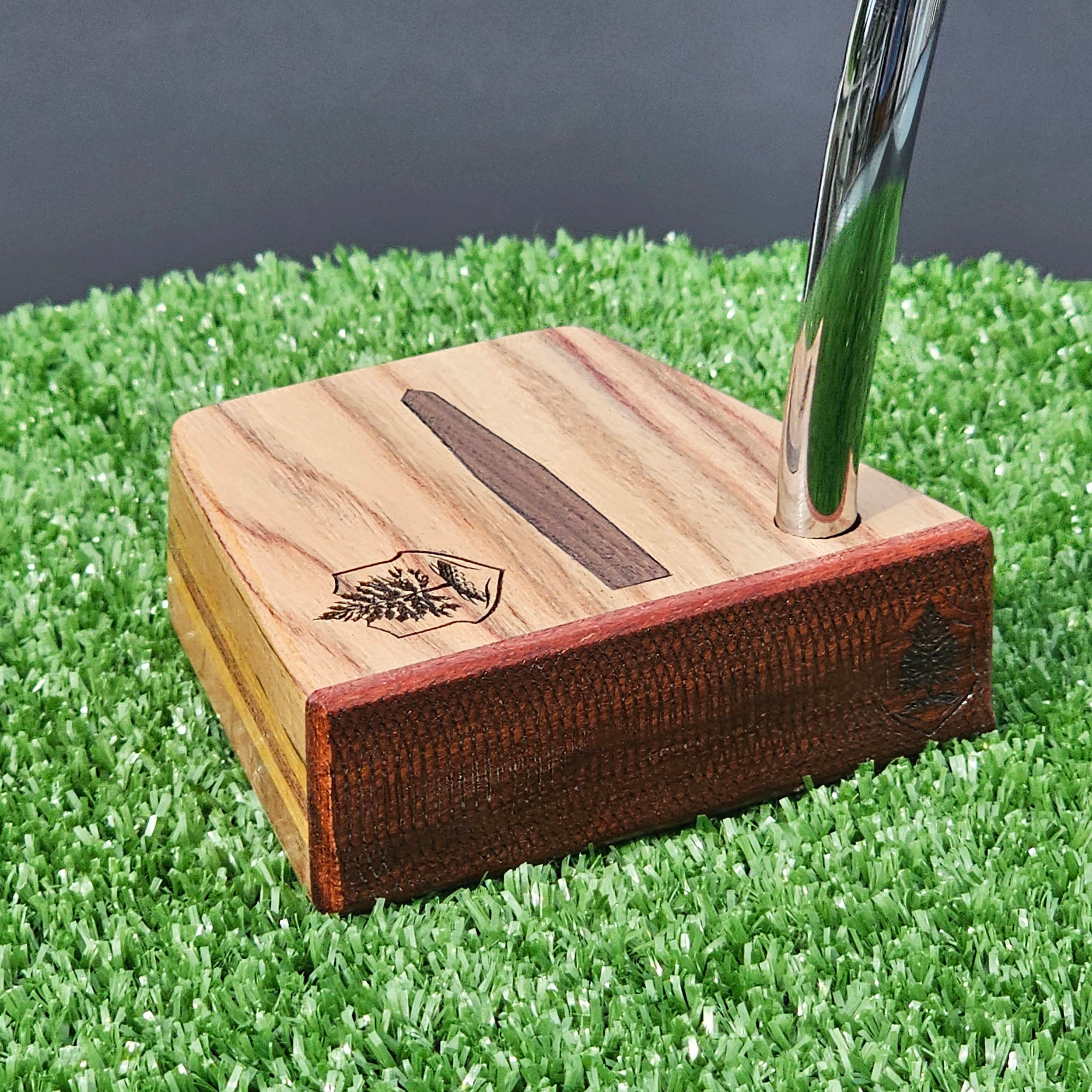 Canarywood and cedar layered putter with Paduak wood faceplate