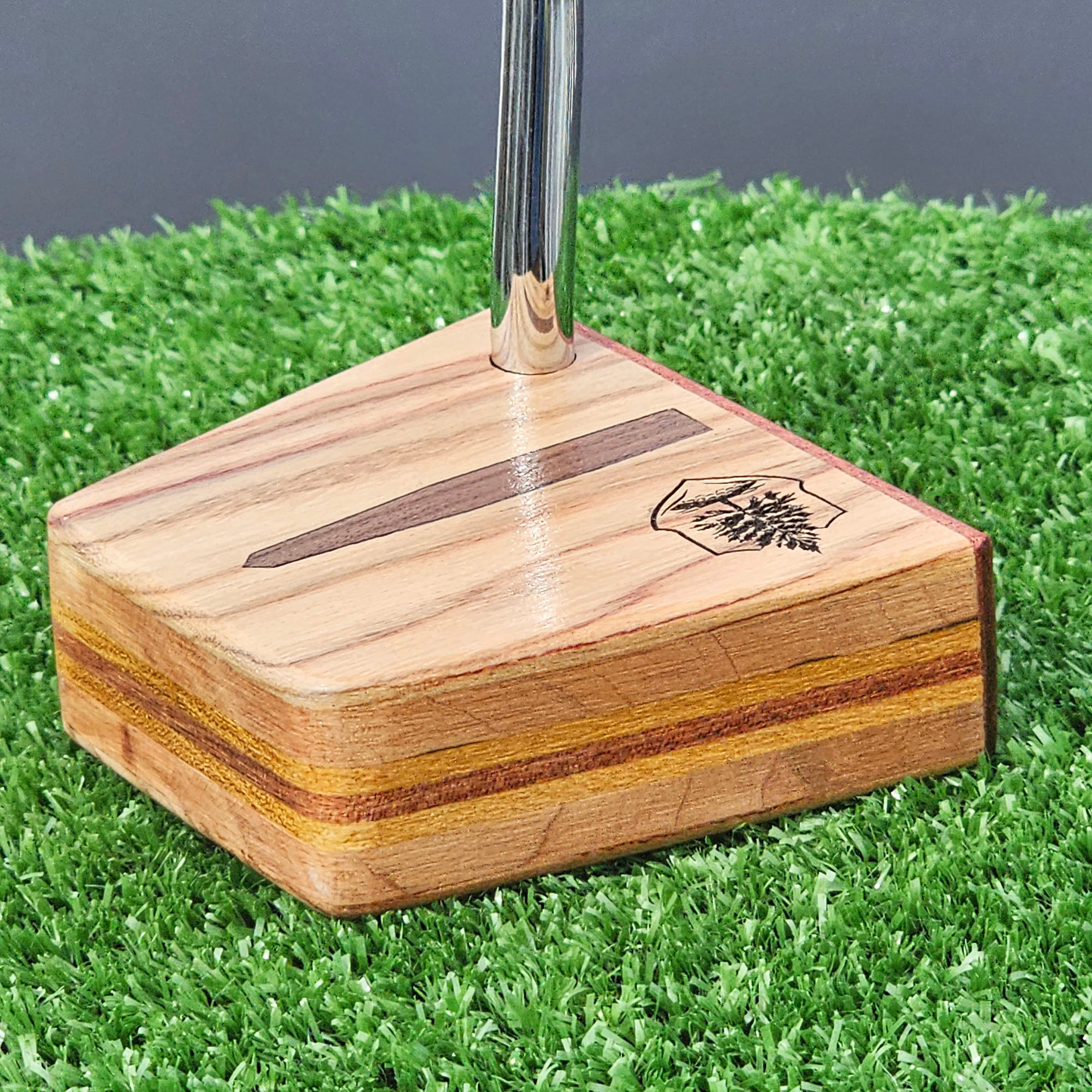 Canarywood and cedar layered putter with Paduak wood faceplate