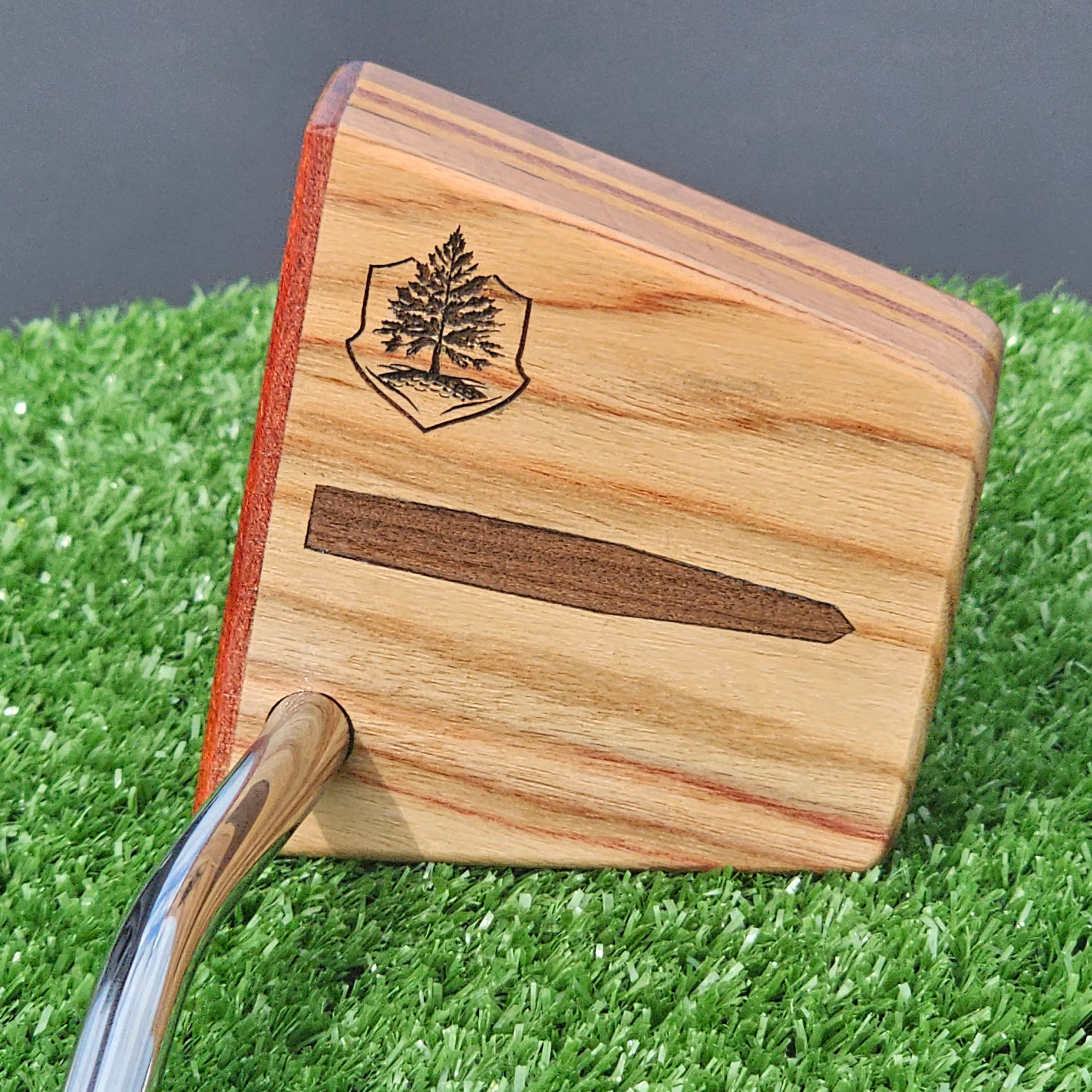 Canarywood and cedar layered putter with Paduak wood faceplate