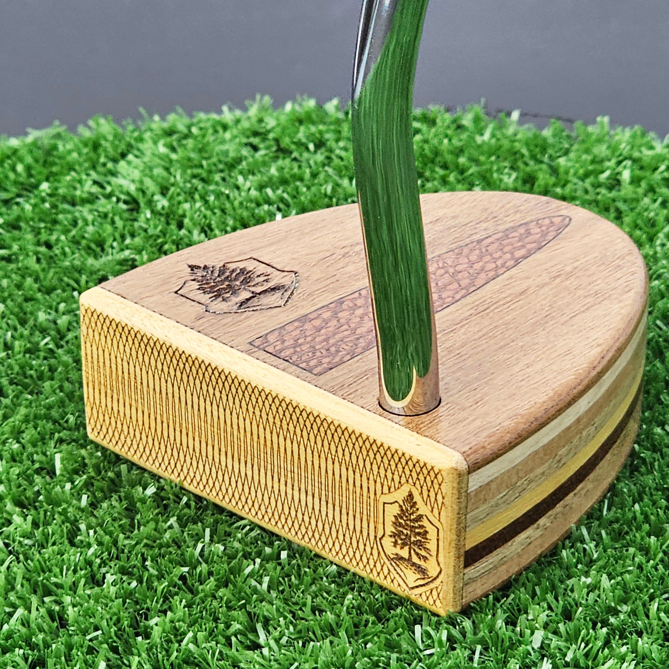 Teak wood putter with Lacewood inlay and layered multiwood body