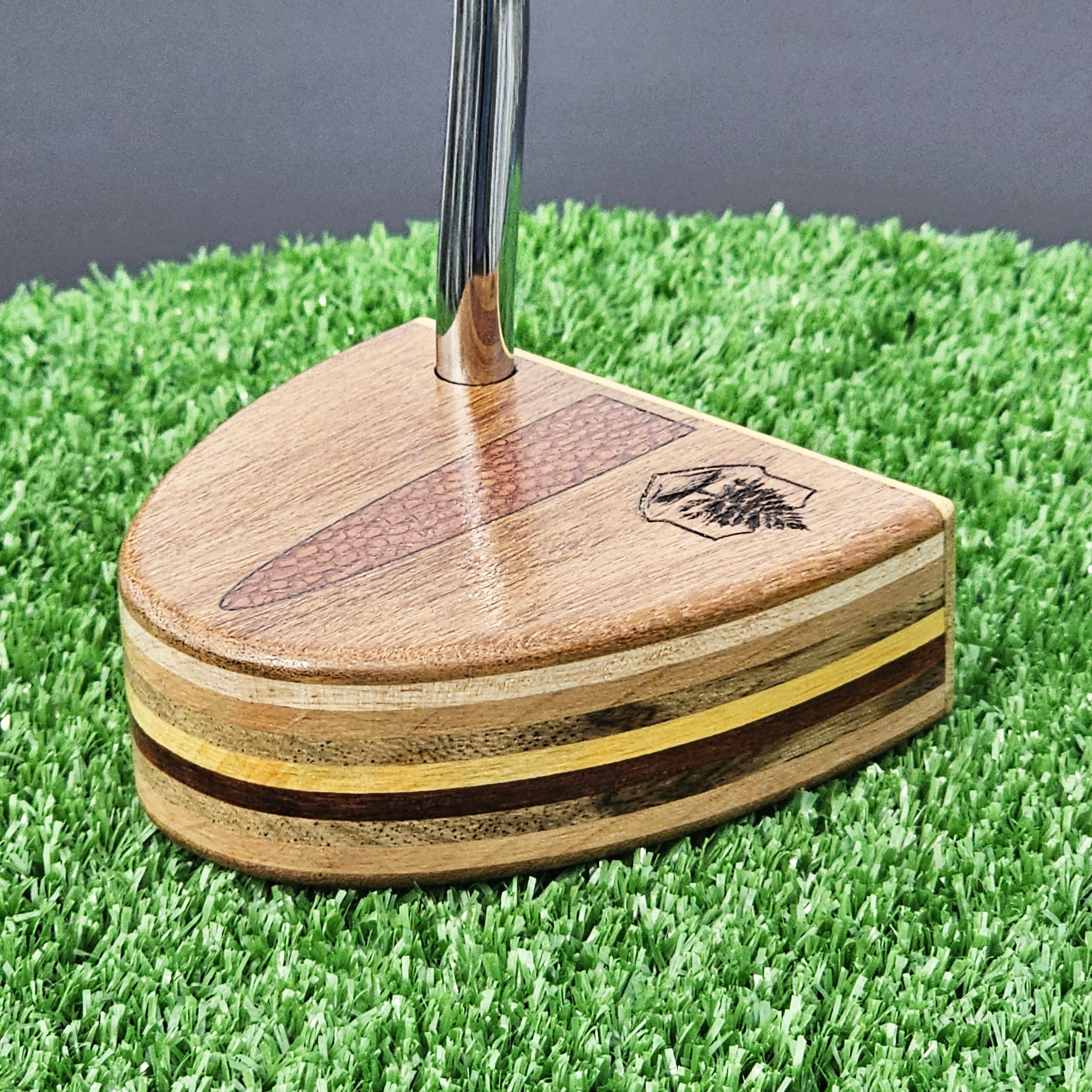 Teak wood putter with Lacewood inlay and layered multiwood body