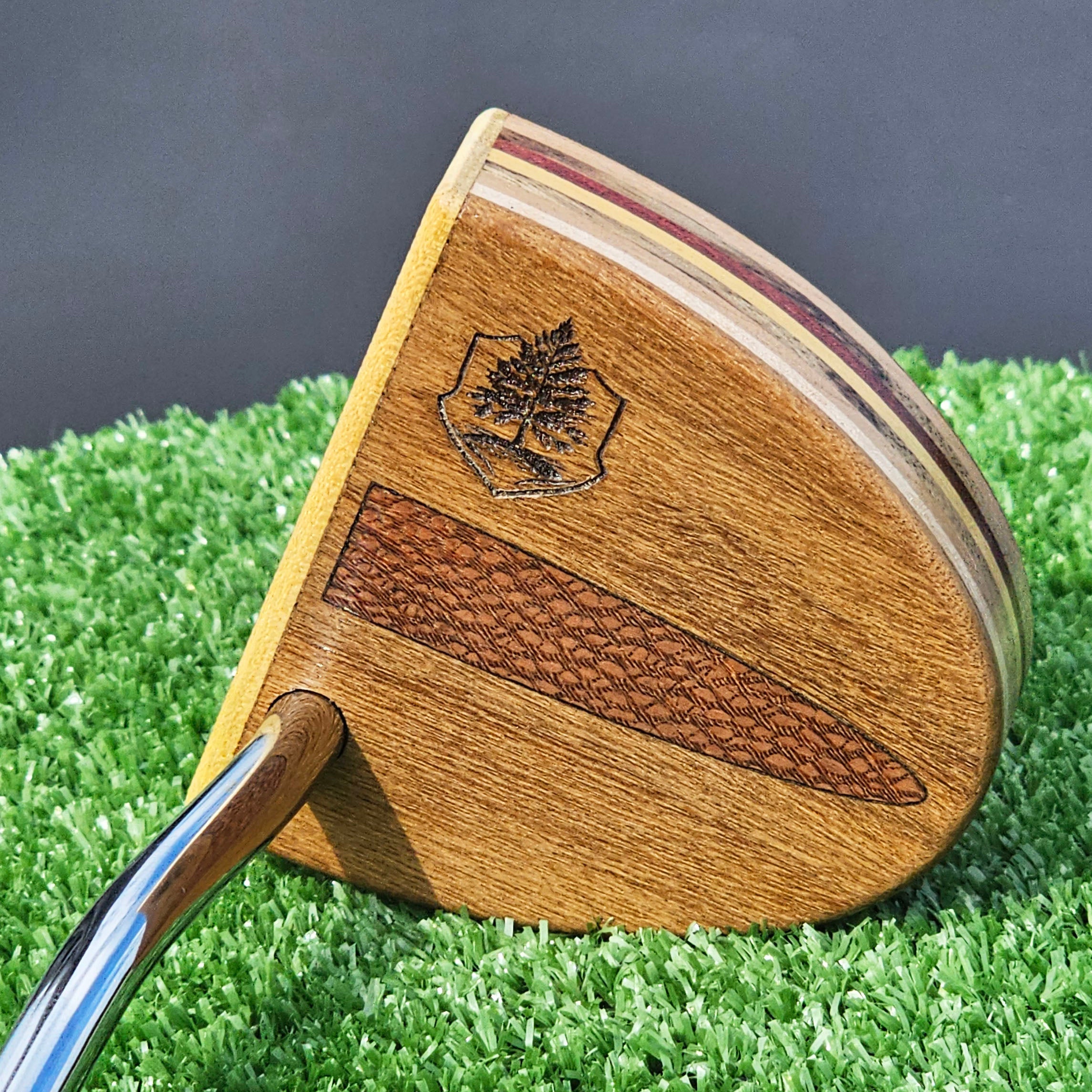 Teak wood putter with Lacewood inlay and layered multiwood body