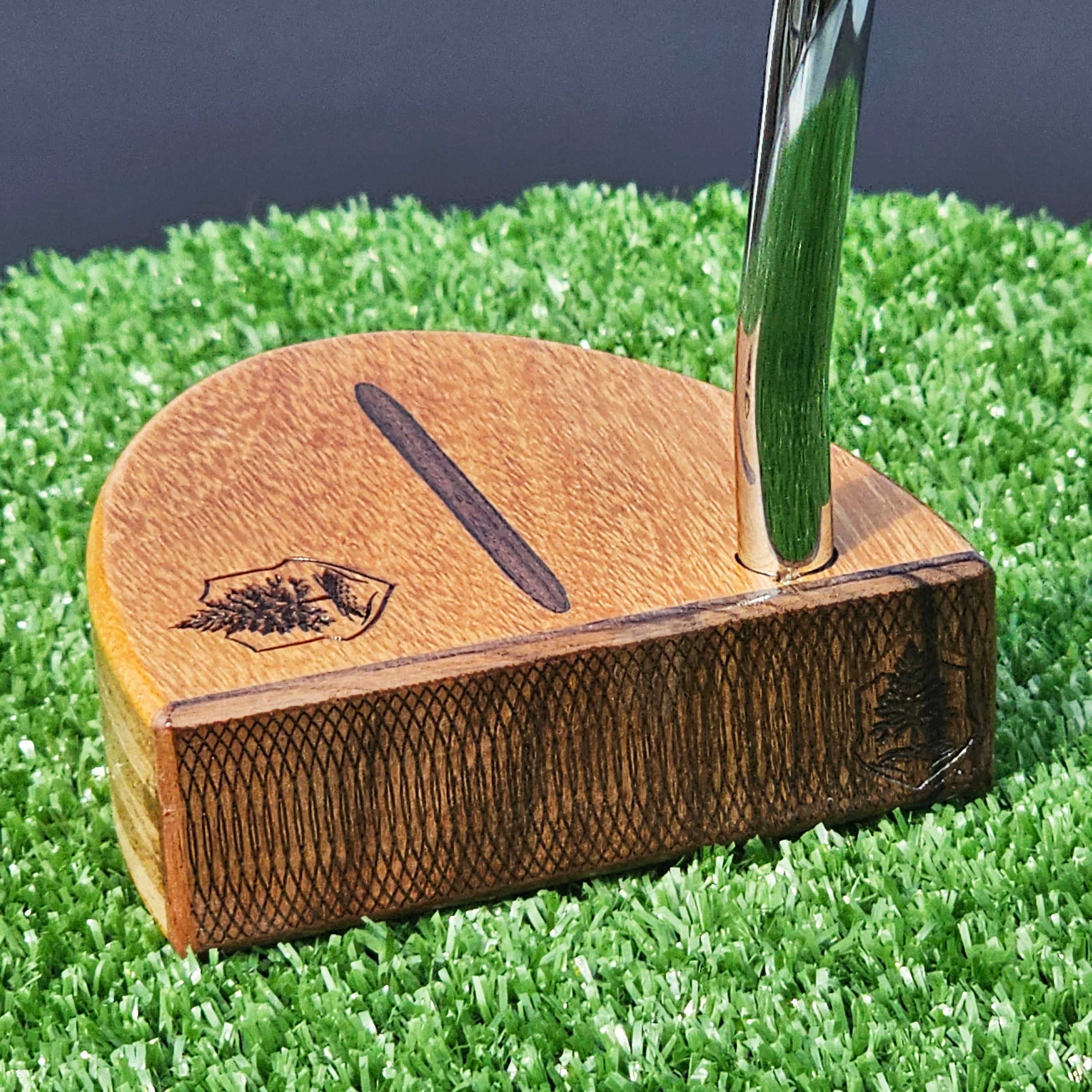 Osage Orange exotic wood putter with walnut and mahogany layered body