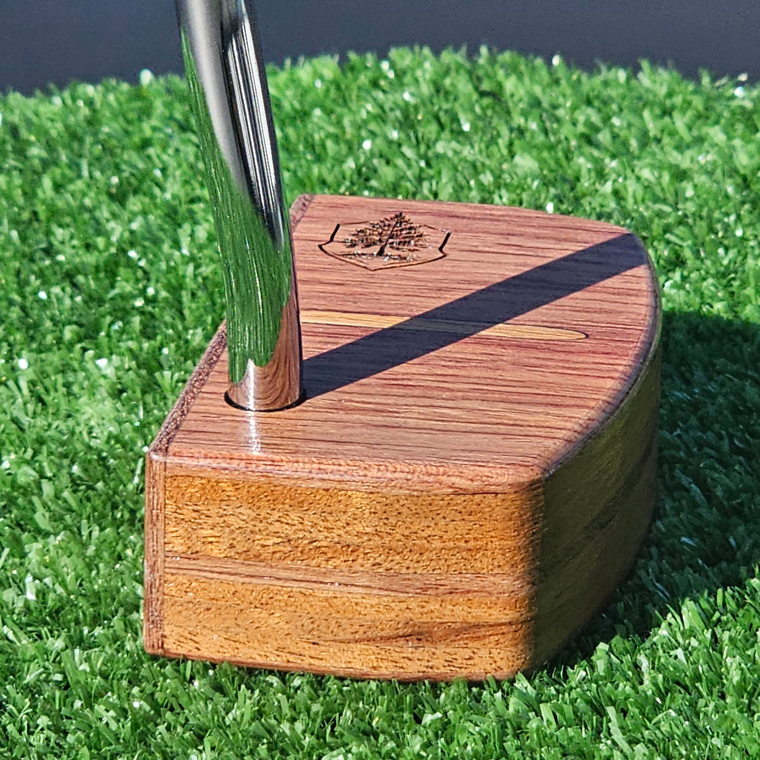 Bubinga exotic wood putter with Canarywood inlay and layered exotic wood body