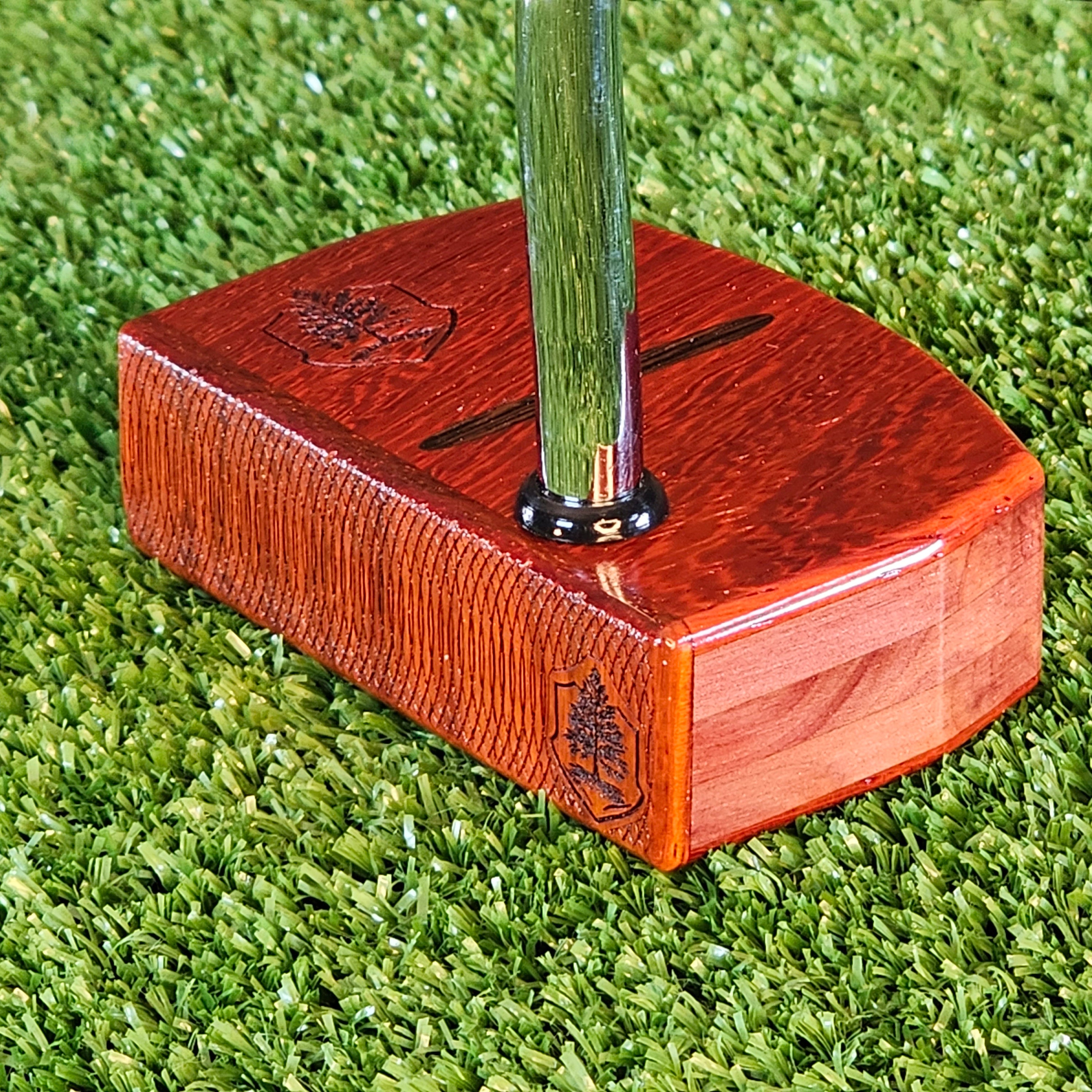 Padauk wood putter with red cedar body and Wenge inlay