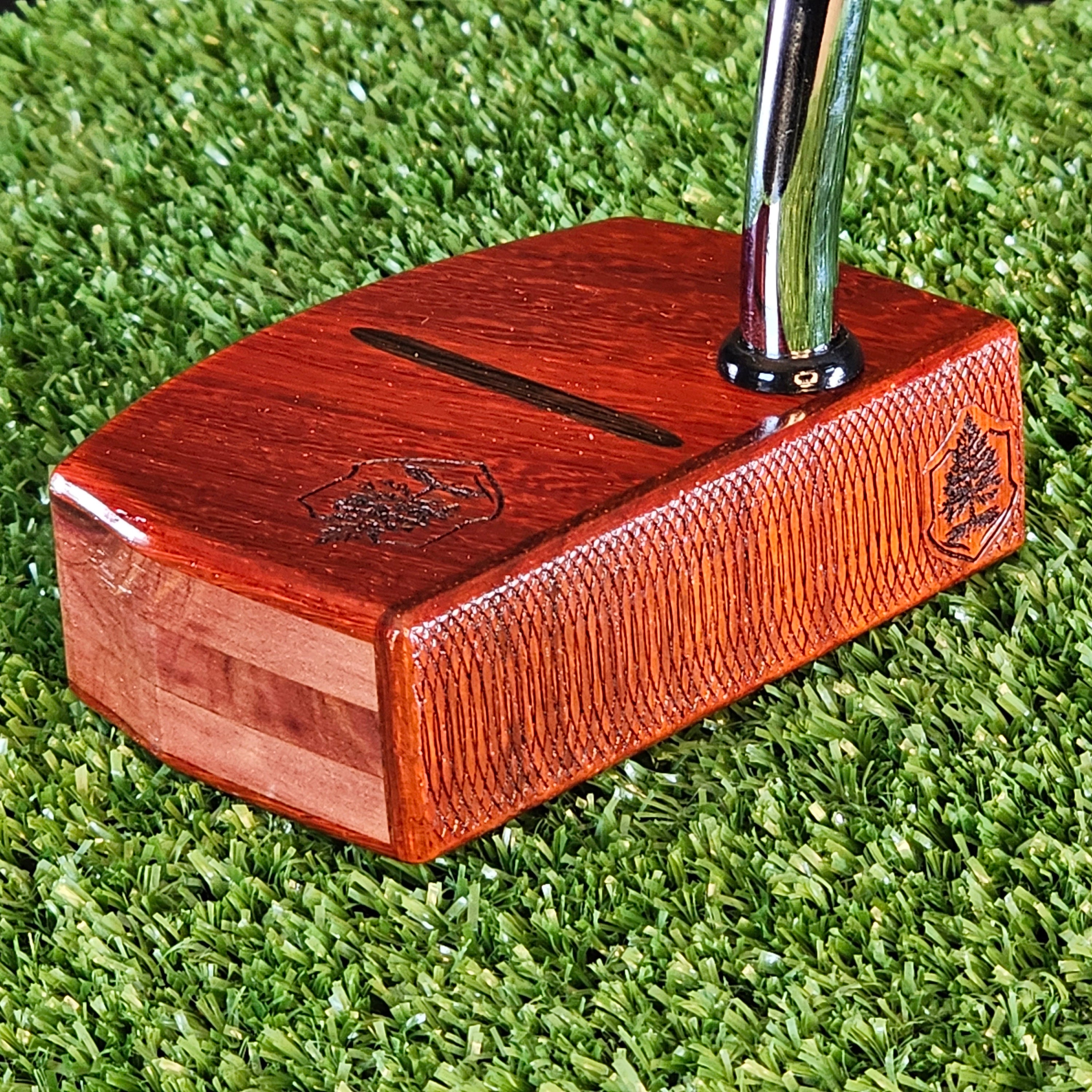 Padauk wood putter with red cedar body and Wenge inlay