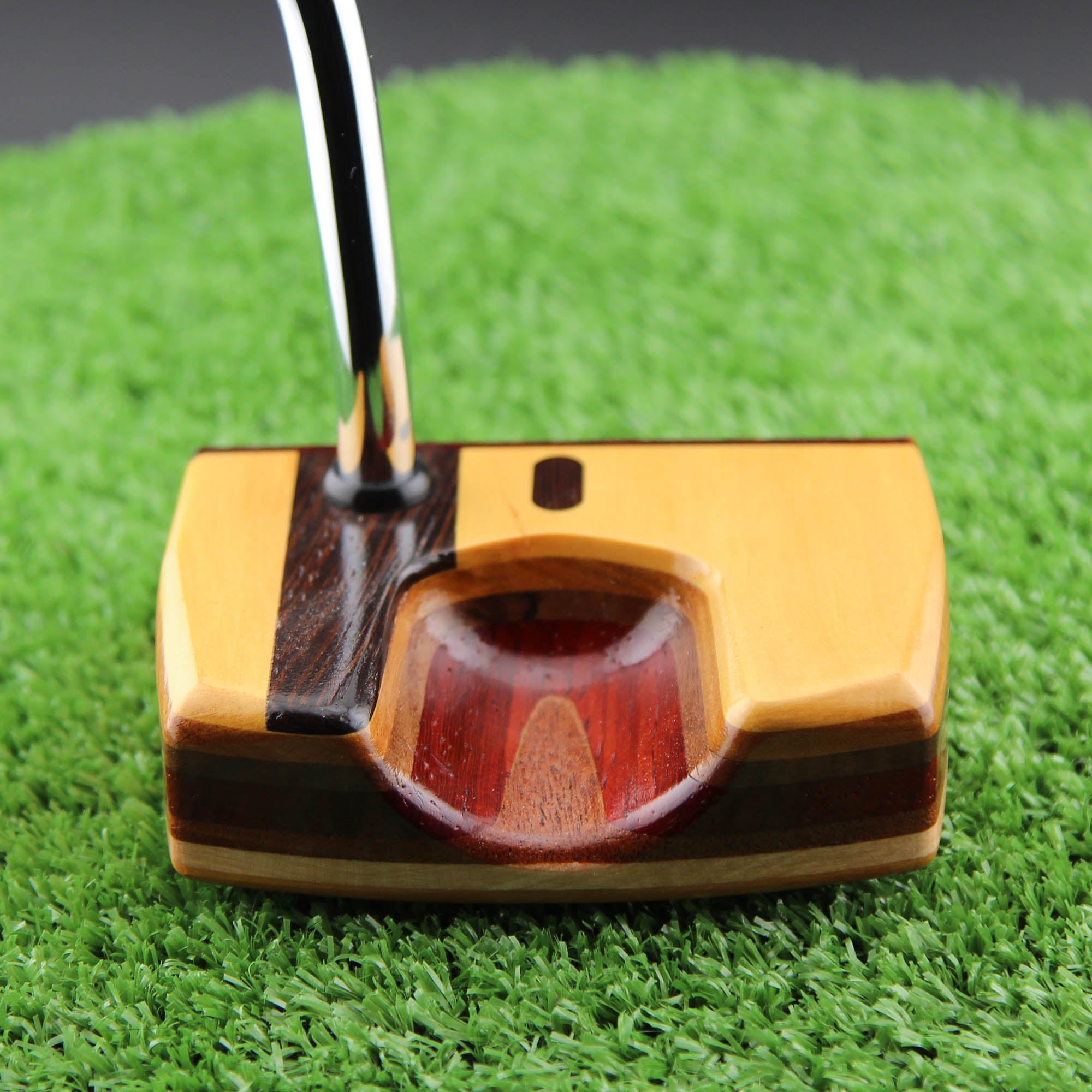 Yellowheart Heel Stripe Exotic Wood Putter with multiple layered woods