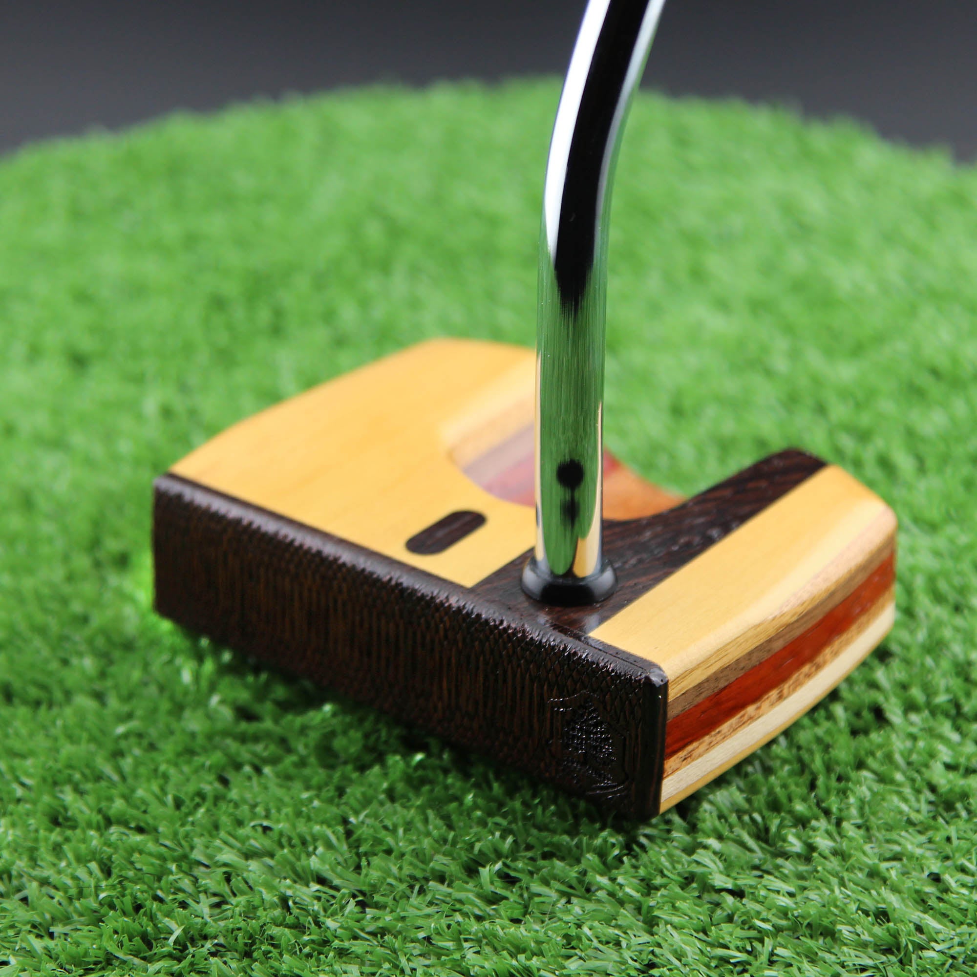 Yellowheart Heel Stripe Exotic Wood Putter with multiple layered woods