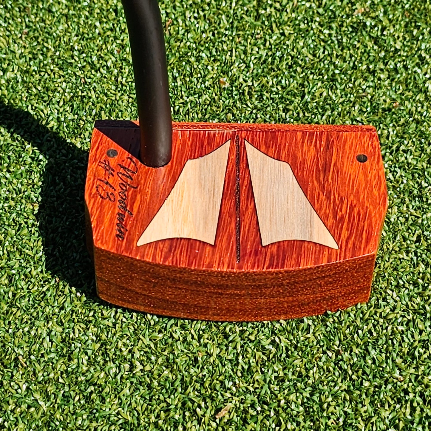 Padauk wood body putter with Maple inlays