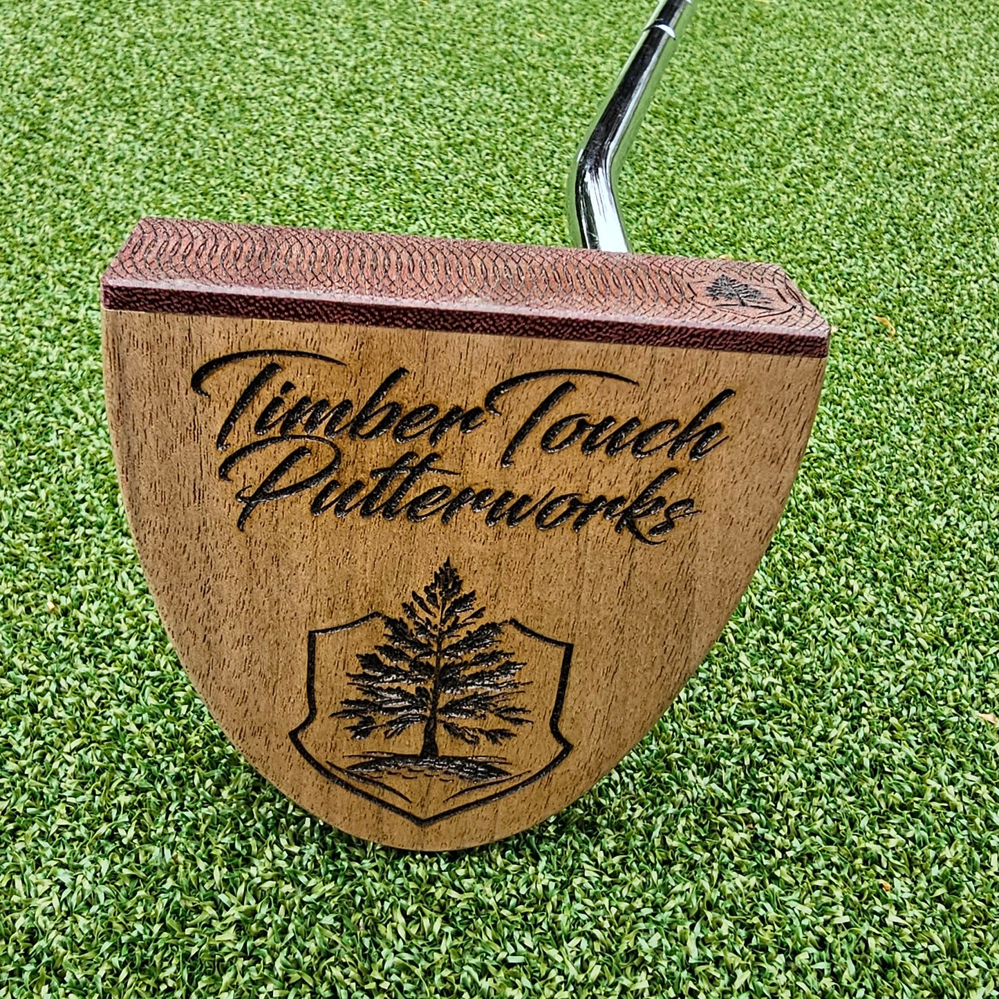 Walnut body putter with Purpleheart face plate