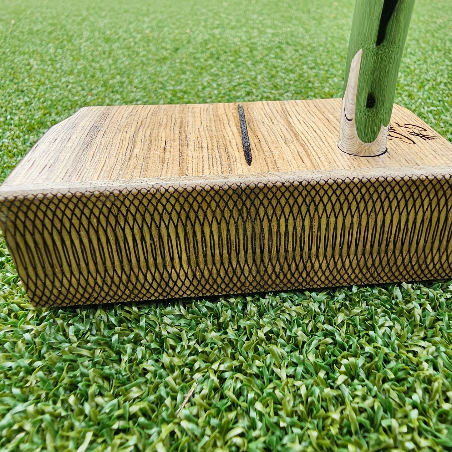 Black Limba wood top and face putter with Hard Oak Body