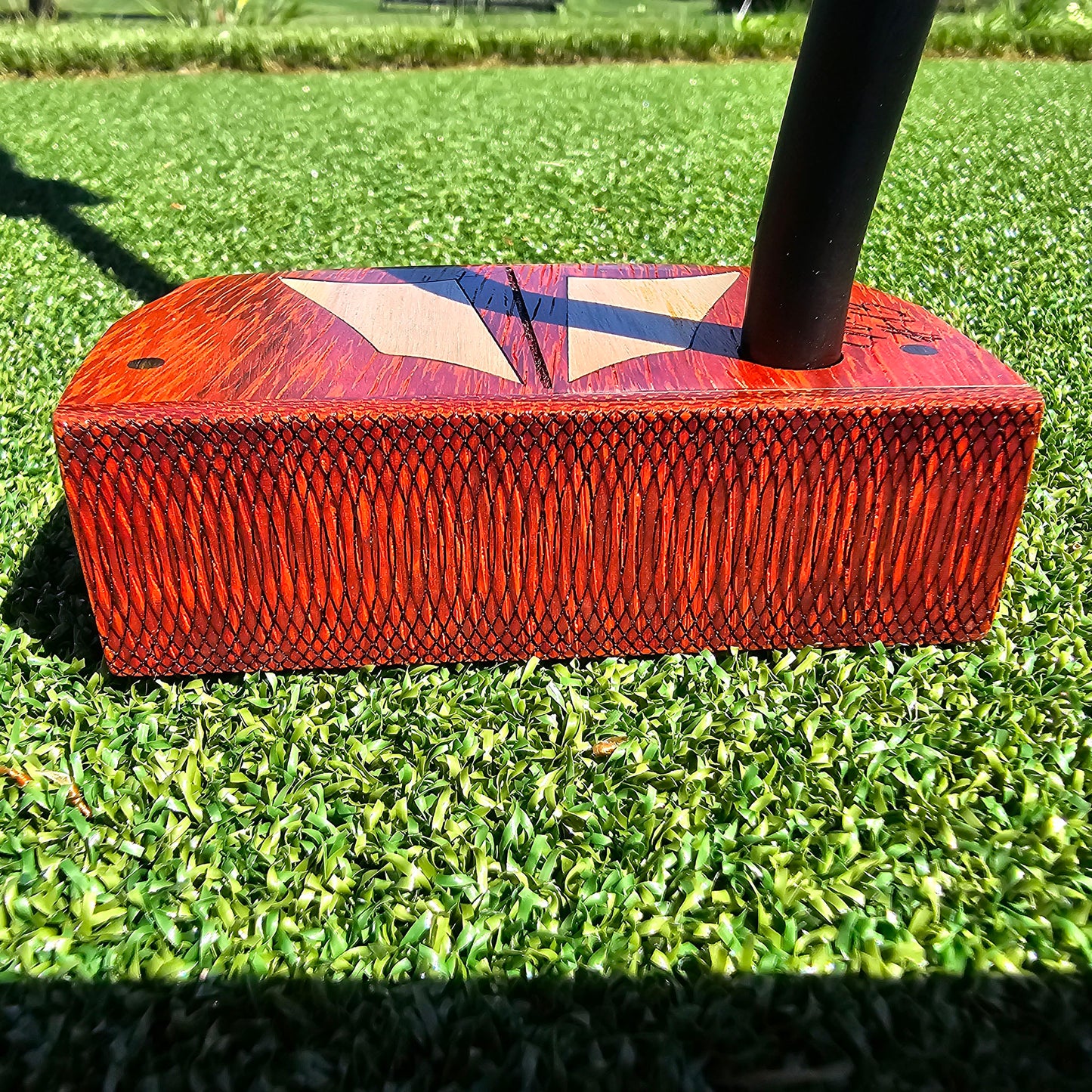 Padauk wood body putter with Maple inlays