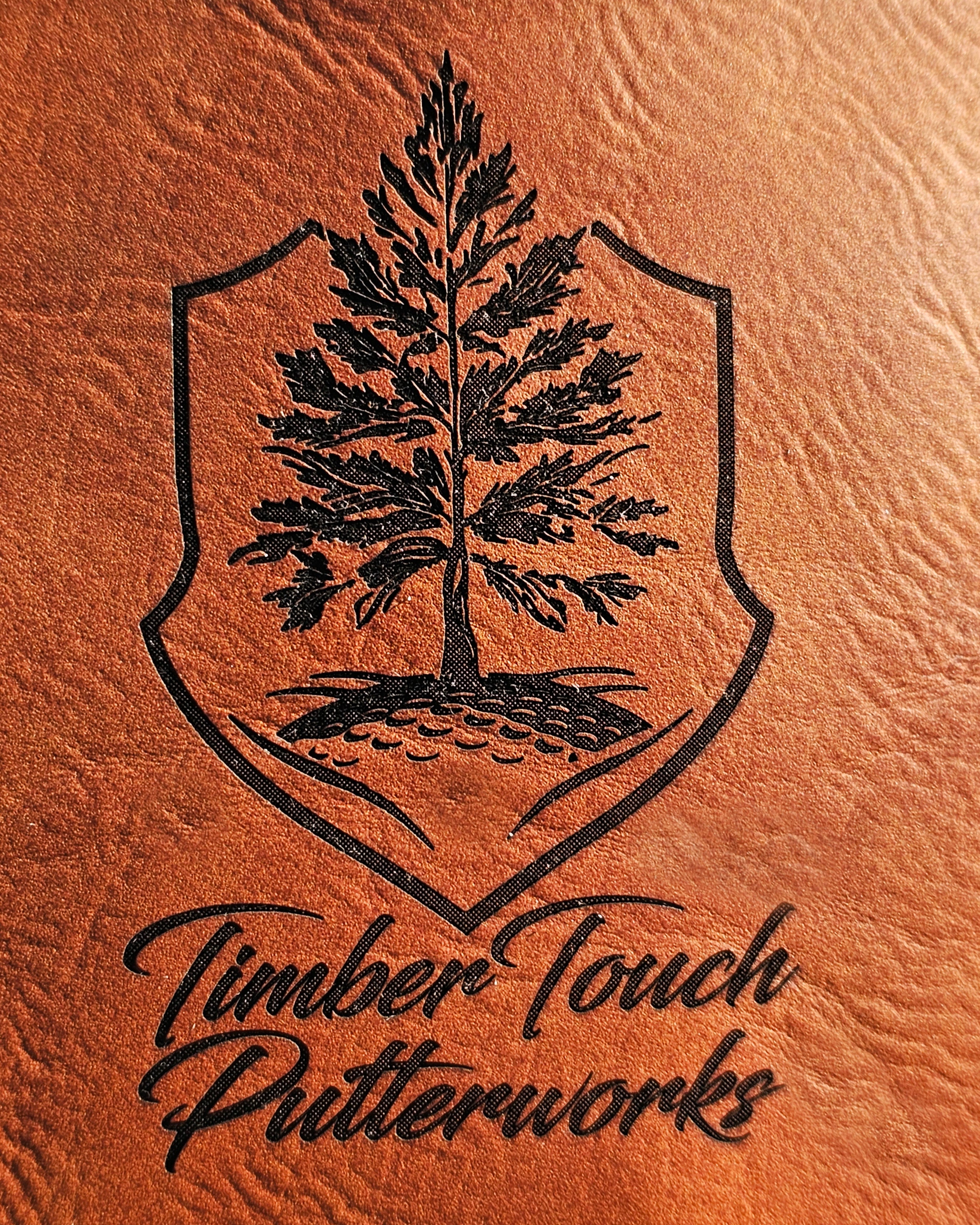 Laser etched drink coosie with TimberTouch logo