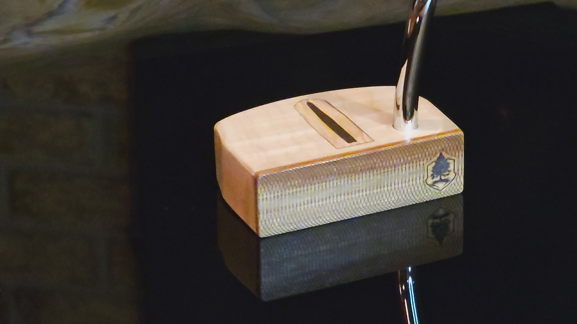 Curly Maple putter with Canarywood faceplate and olivewood inlay