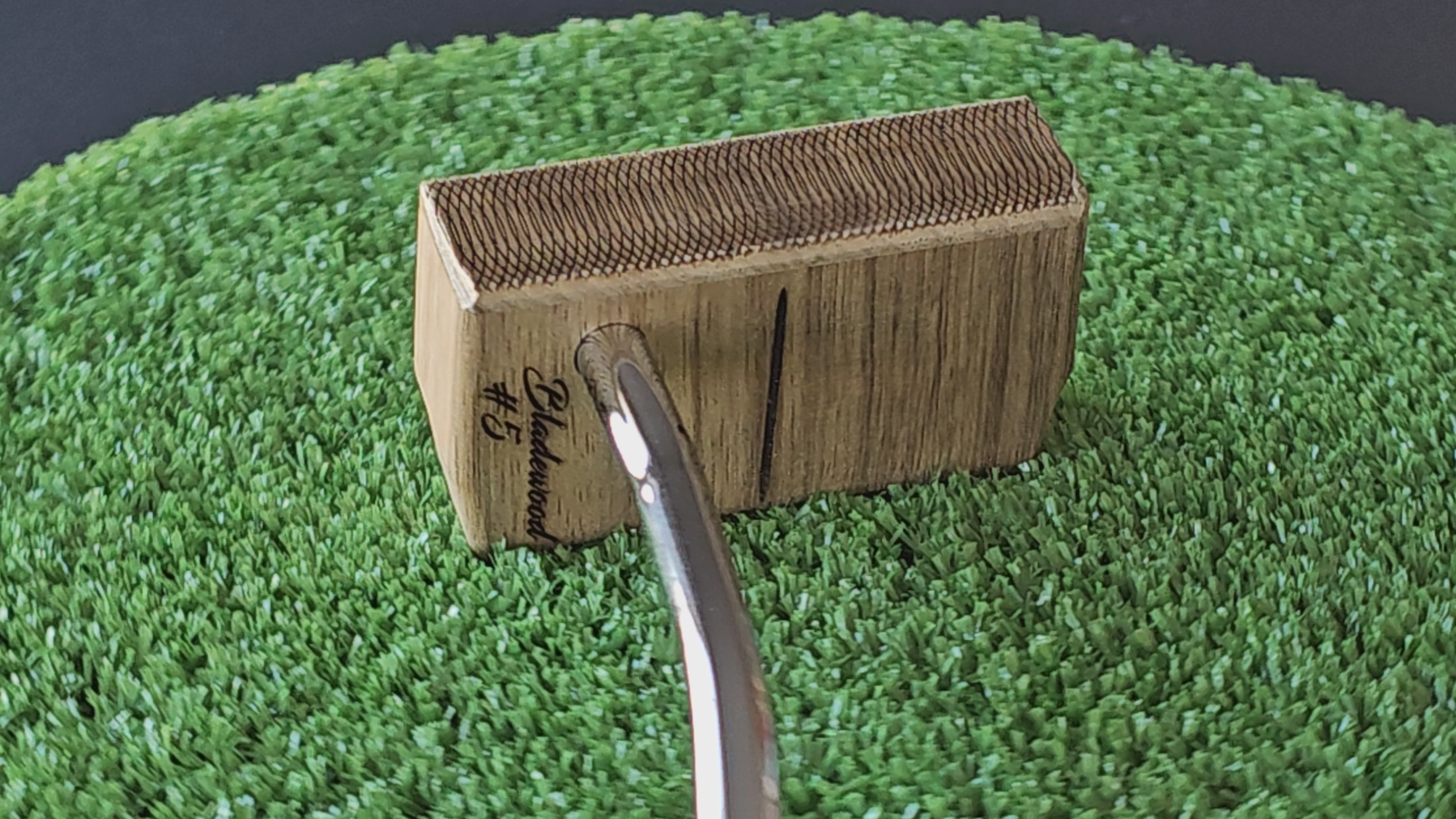 Black Limba wood top and face putter with Hard Oak Body