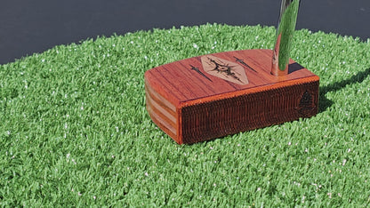 Layered Bloodwood and Red Cedar putter with decorative inlay