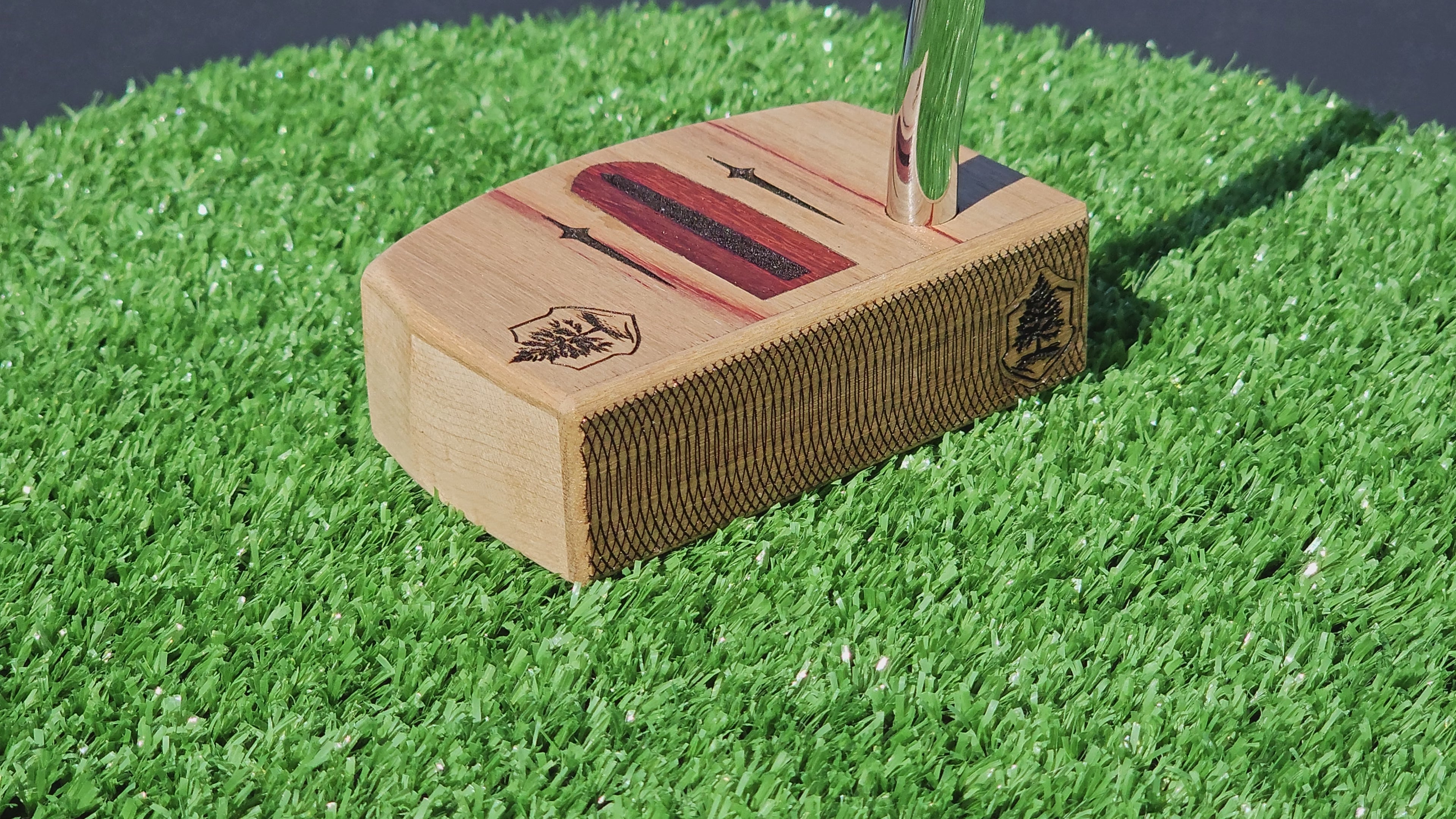 Curly Maple putter with Canarywood top and faceplate with Paduak Inlay