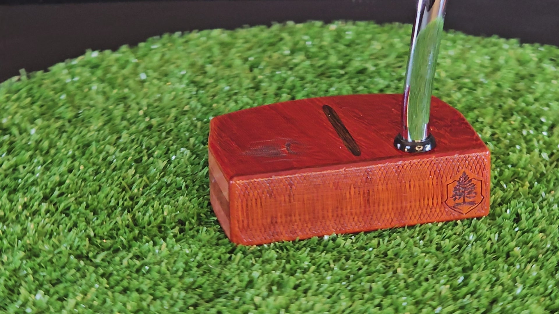 Padauk wood putter with red cedar body and Wenge inlay