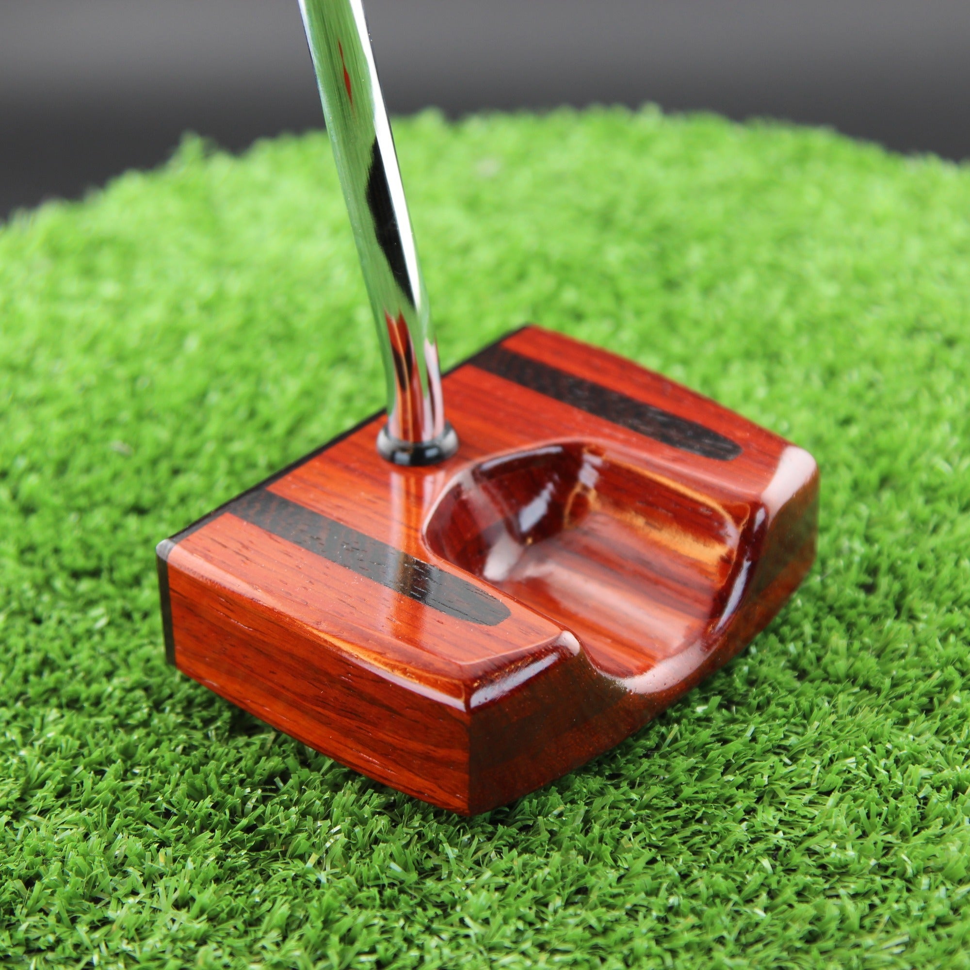 TimberTouch Bloodline blade wood putter with Padauk, Wenge and Bloodwood center shaft zero torque – sole and toe angle view